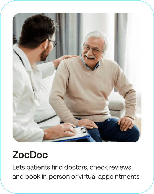 Person talking with a doctor in an in-person appointment, booked through the Zocdoc application.