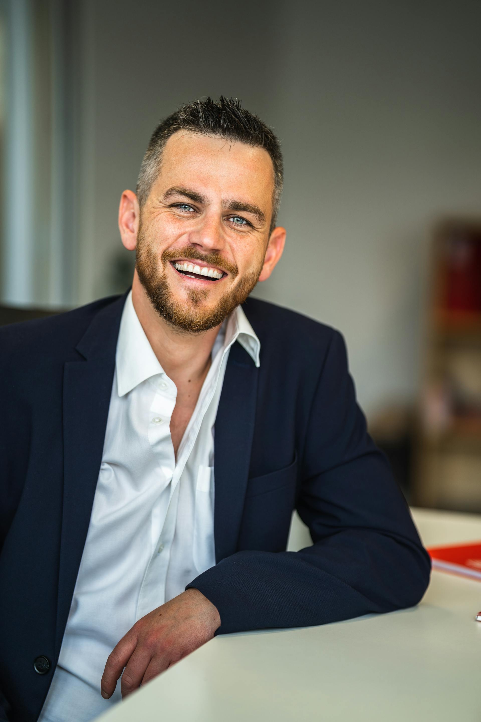 man in office smiling