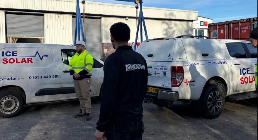 Branddwr filming Steve from ICE Solar beside the company vans