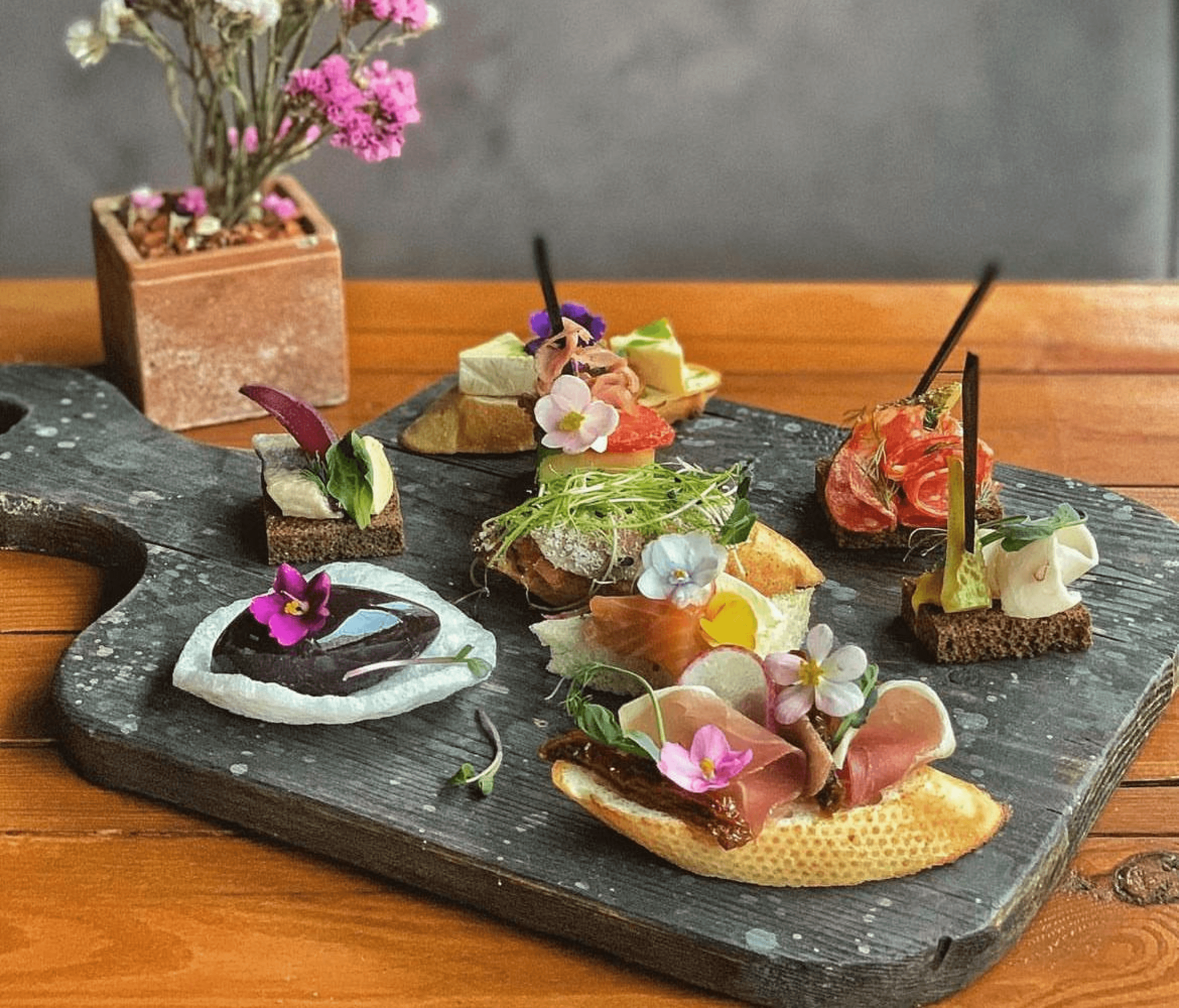 an interior of a fine dining restaurant with focused shot on the table with the plates and glass has been served