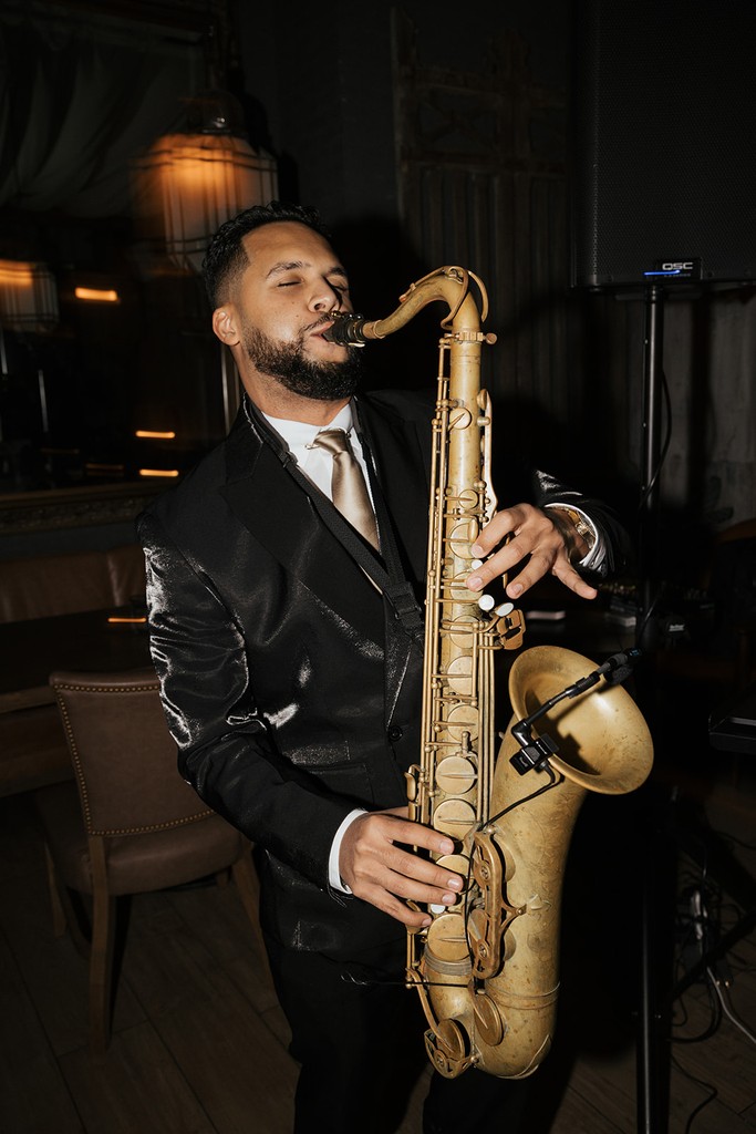 Chicago saxophonist DG Sax playing the saxophone at a corporate event