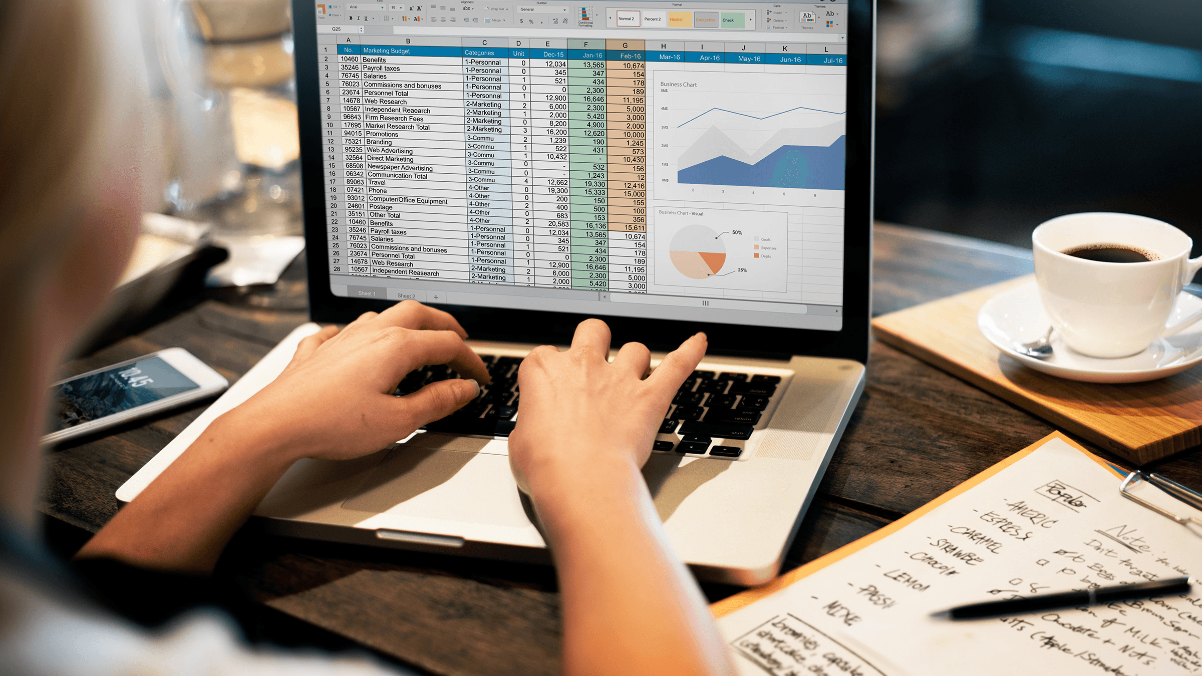Person working on laptop - 7 Ways to Apply Accounting Format in Excel in 10 Minutes