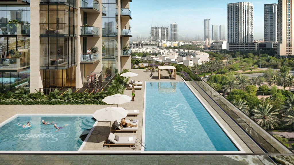 Rooftop pool view at Sapphire 32 Residences: marina towers and surrounding skyline.