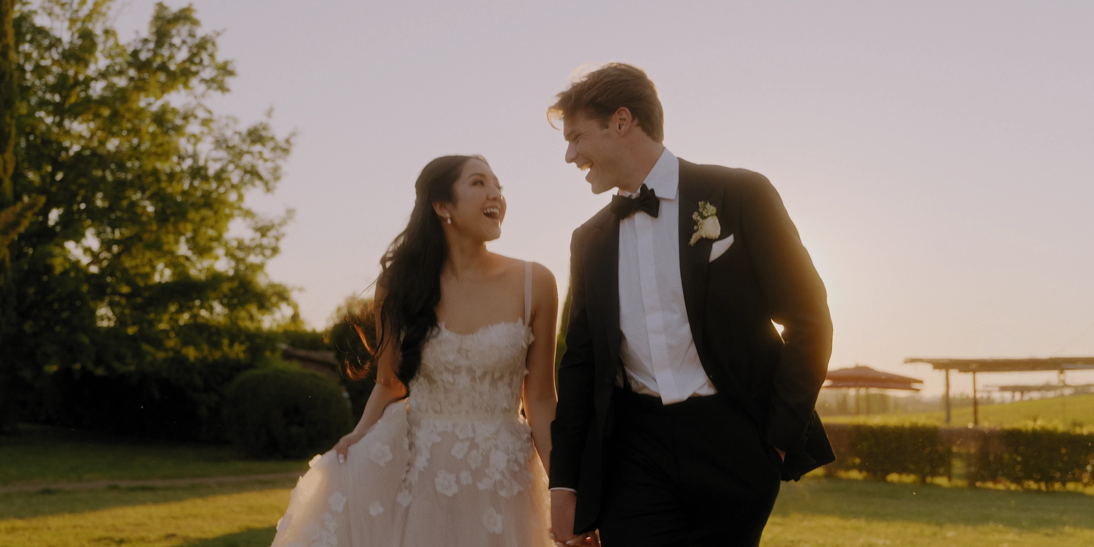 Cinematic wedding film of Rachel and George walking through the gardens of Villa Aura del Lago on Lake Como Italy