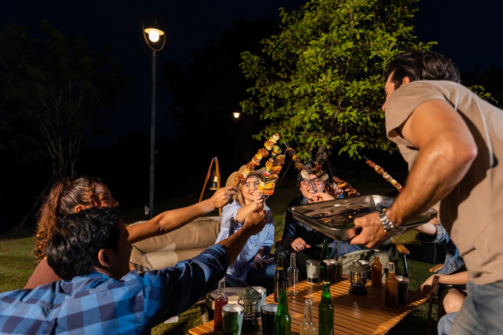 A man standing with Sufboard