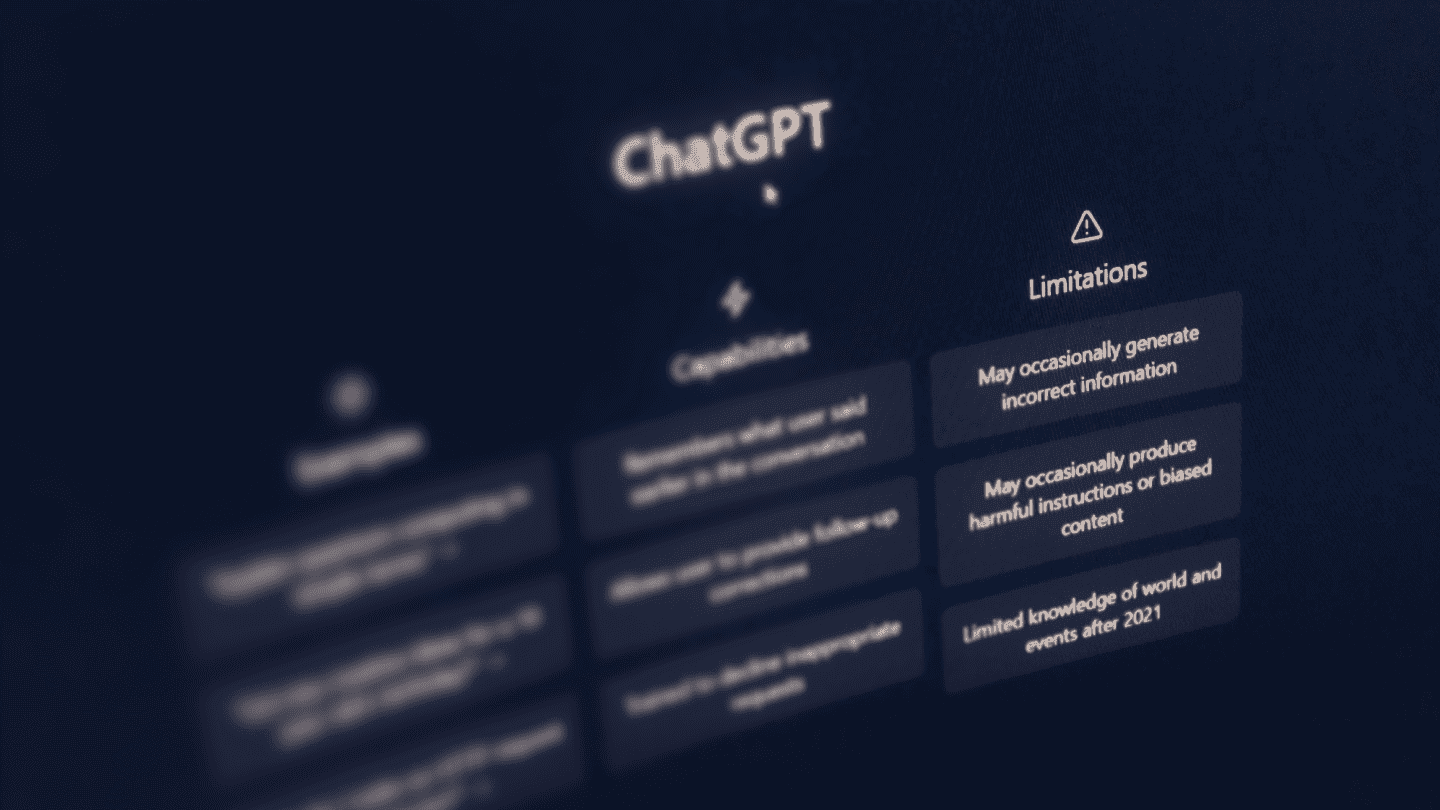 Blurred screen showing "ChatGPT" at the top, with sections labeled "Capabilities" and "Limitations" below. The tone is informative and technical.
