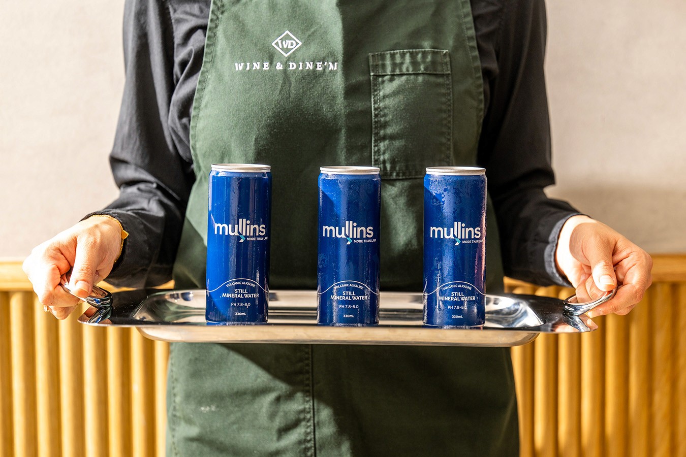 Branded Sparkling Water cans at an Office Opening event