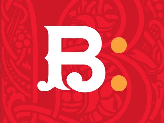 Rustic cabin in a golden field at sunset