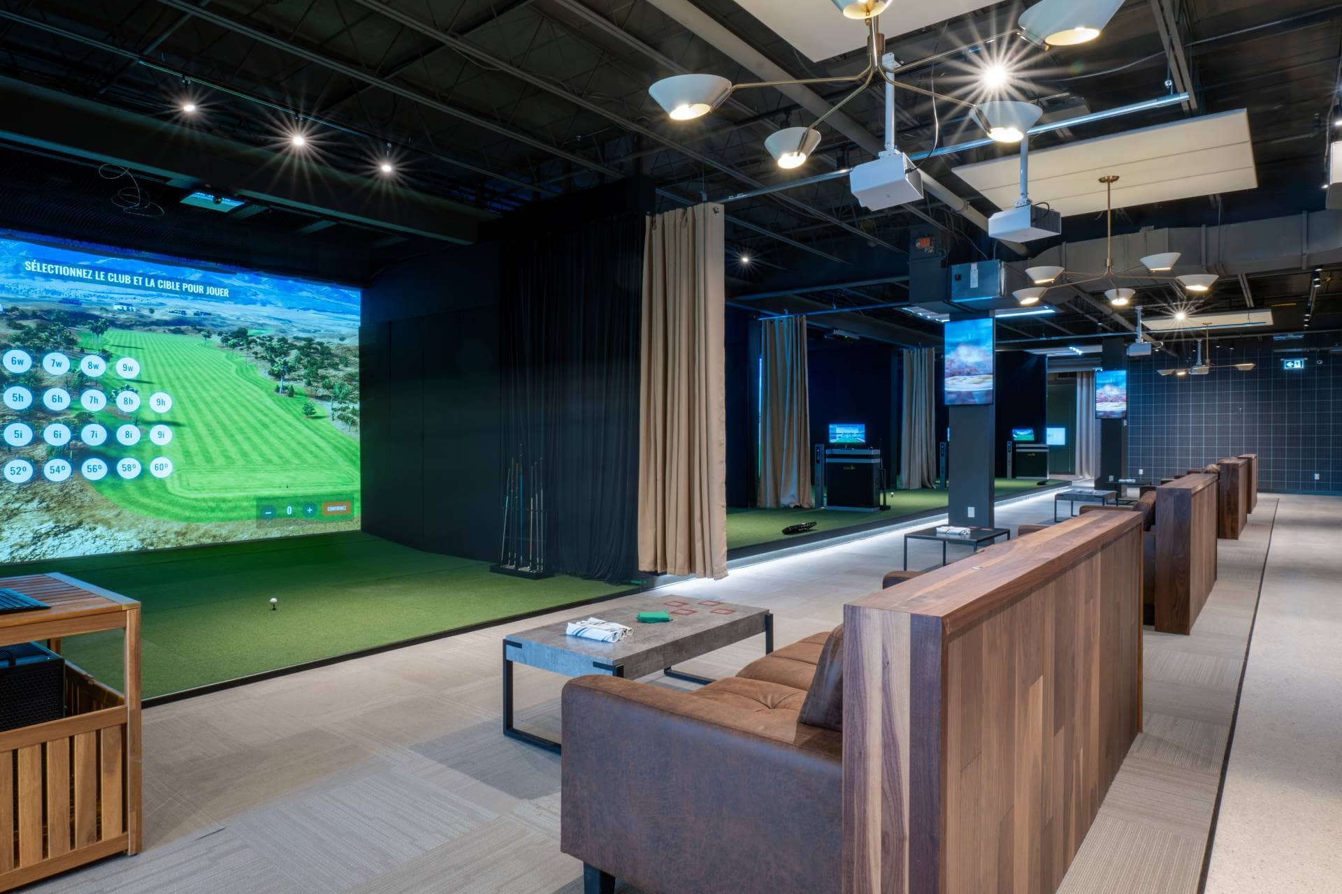 Waiting area of a golf course, looking out at the green.