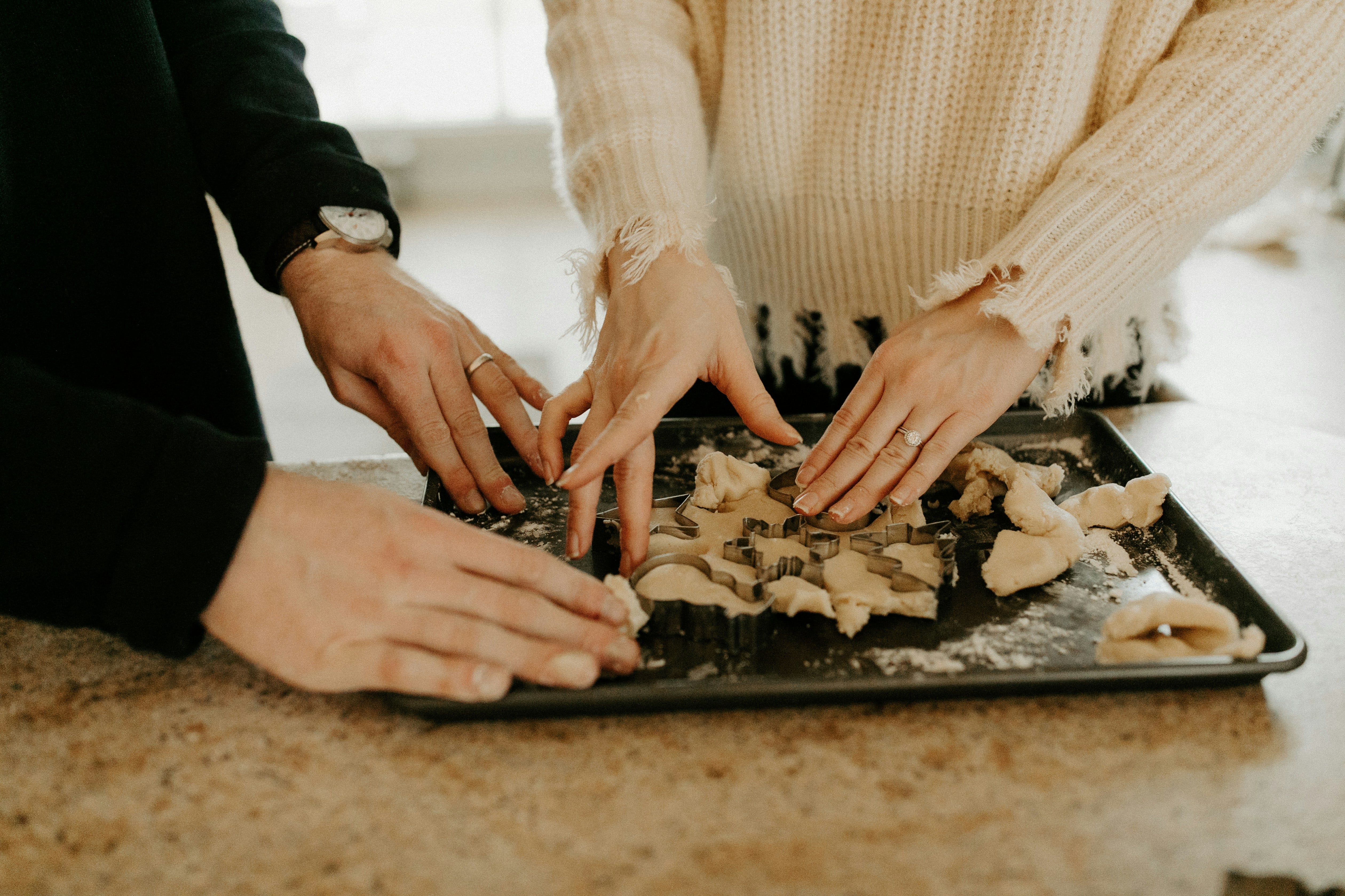 Christmas couple making cookies