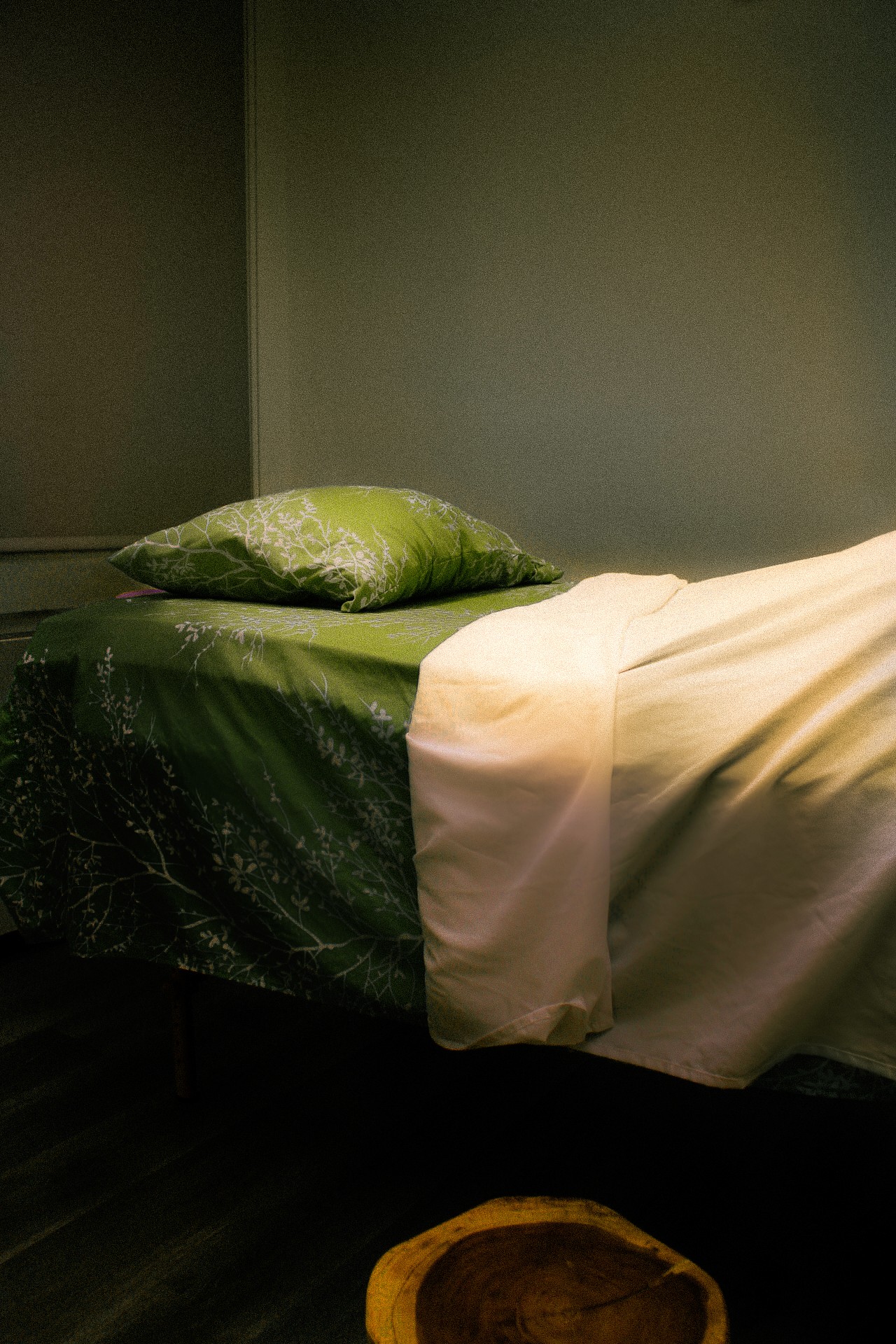 A treatment table with recently placed sheets 