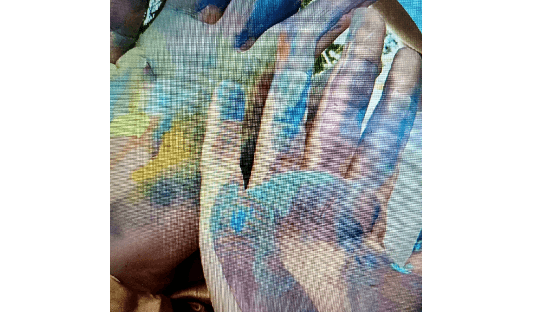hands with paint on them from Heather