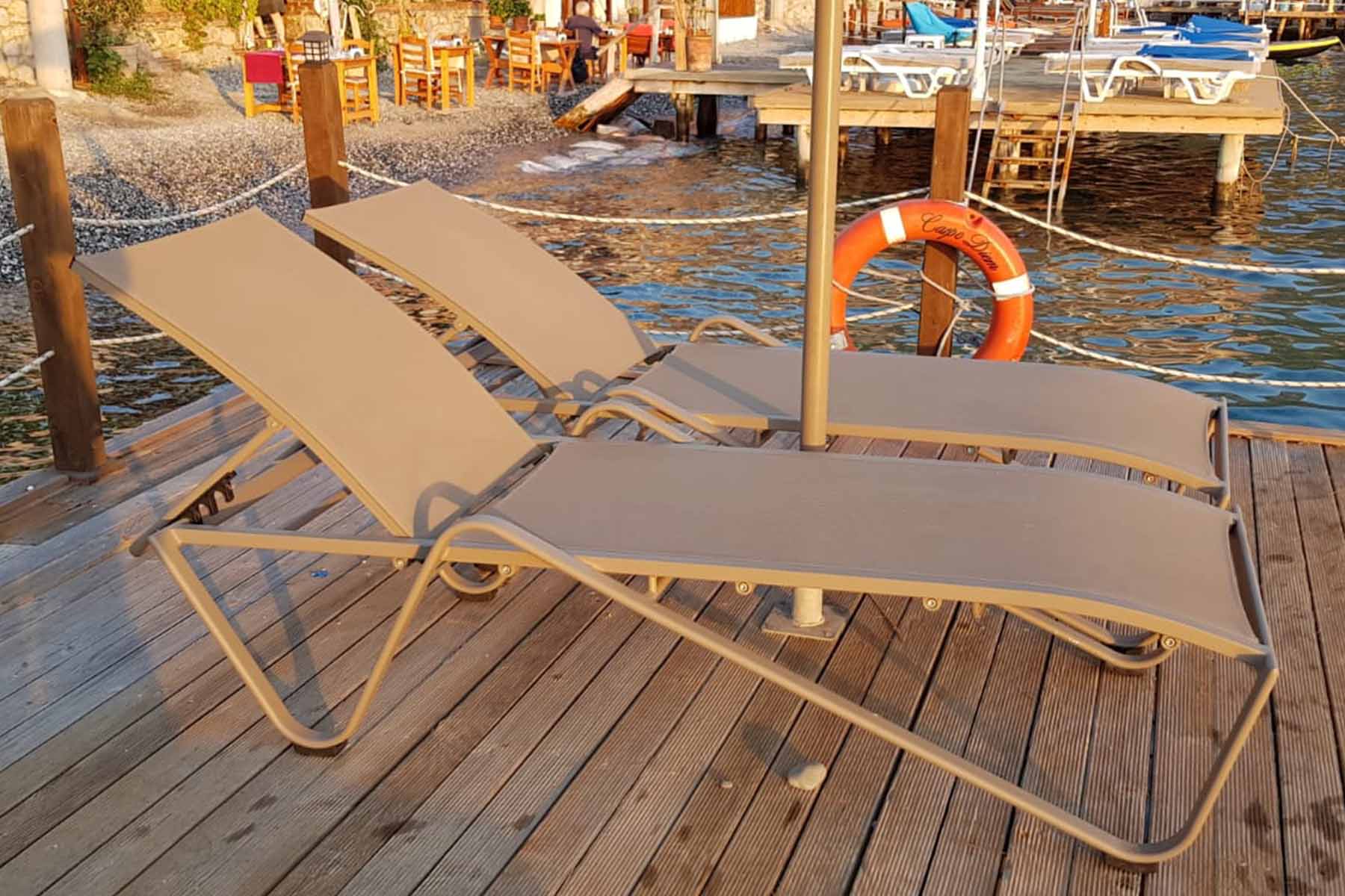 two people looking at a tablet and smiling