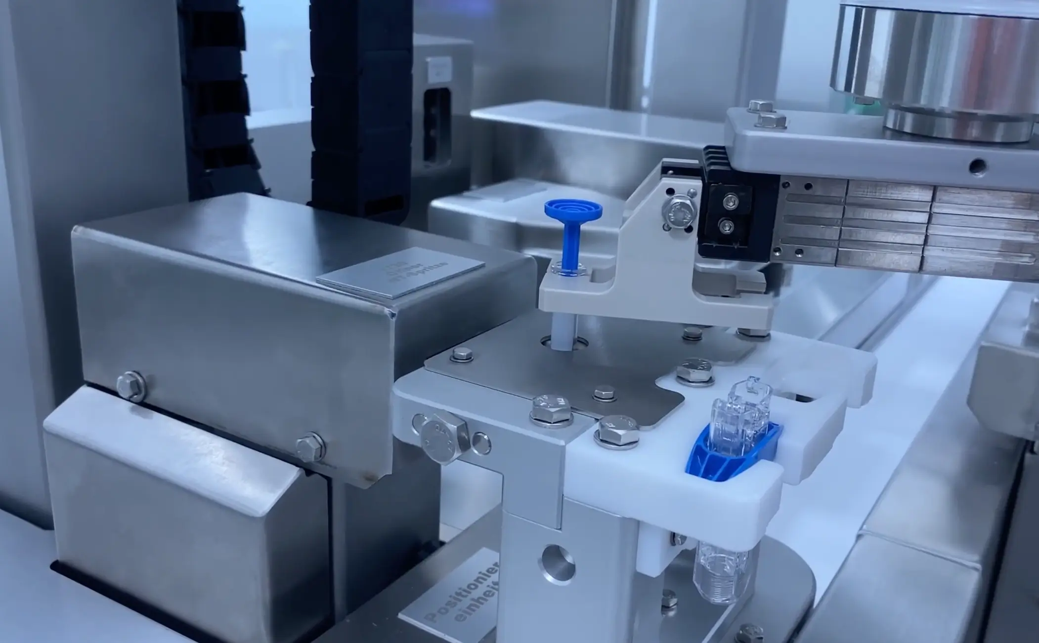 Automated Syringe Assembly with modular Robotics