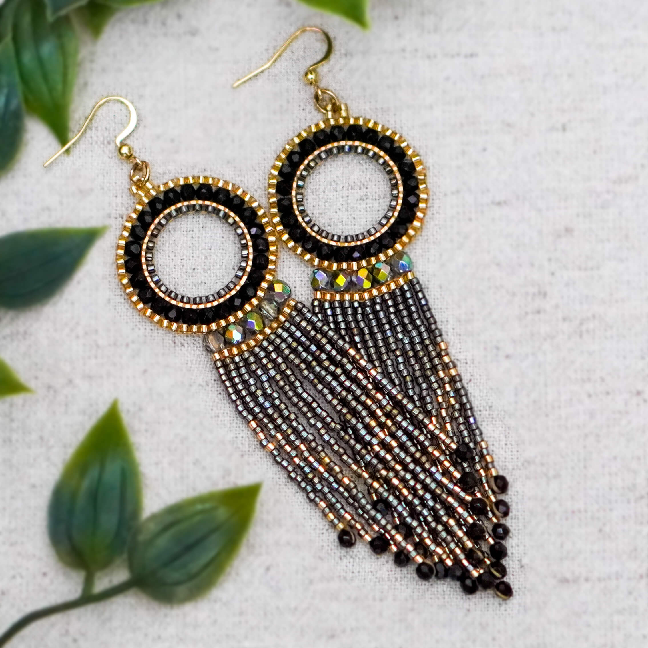 kolczyki astro ciemne brązowe metaliczne czarne kolczyki koła