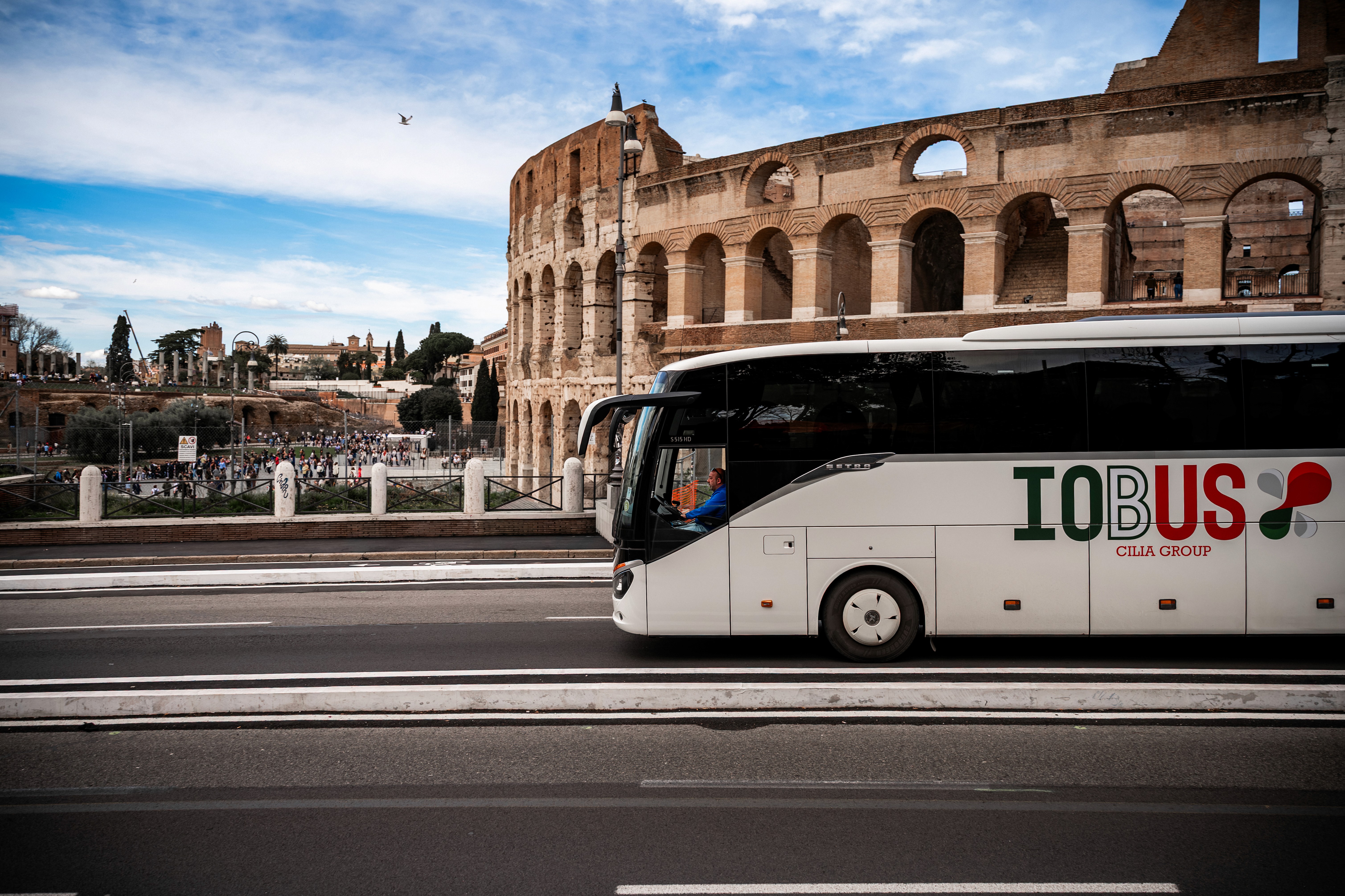 a couple of people standing on top of a mountain