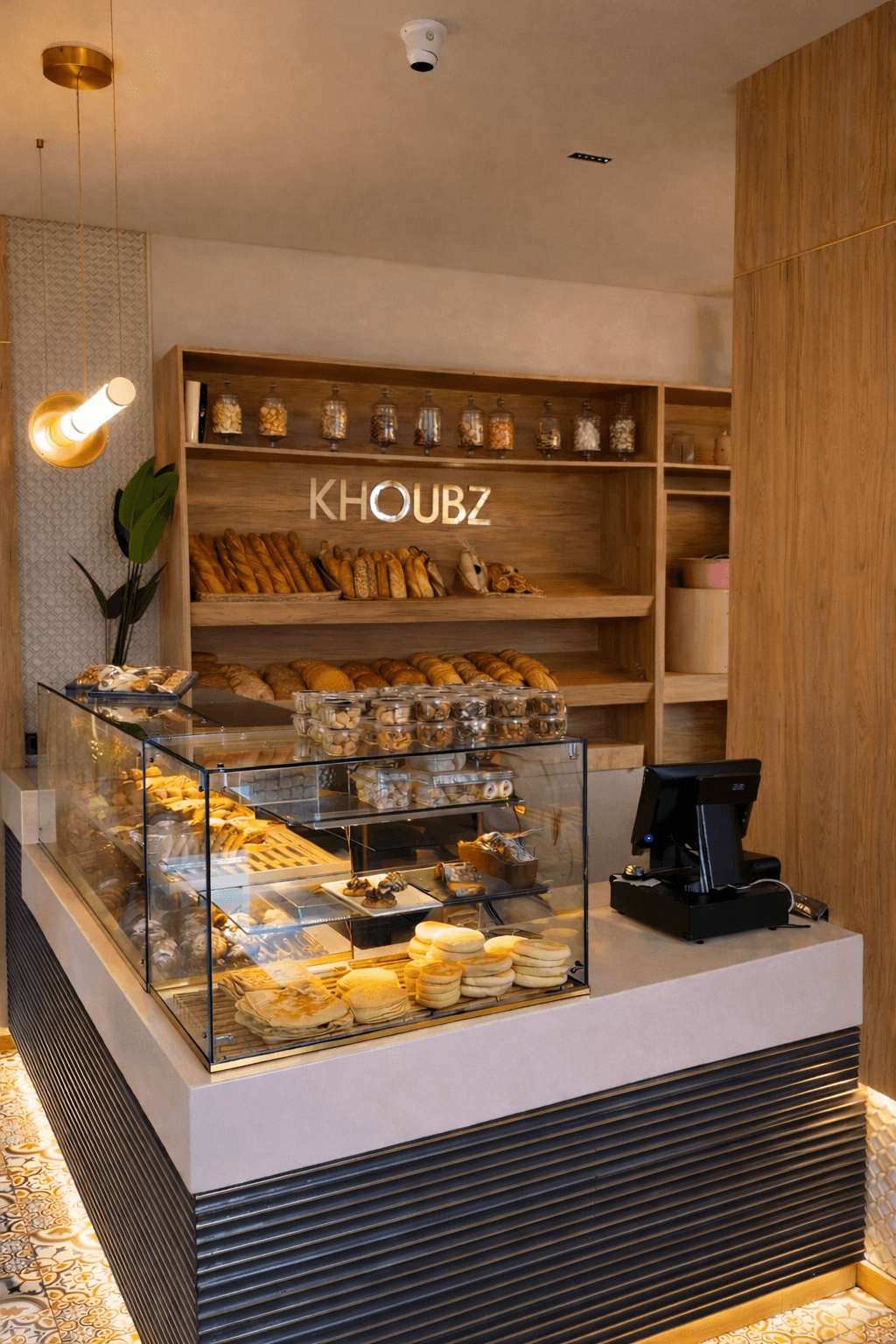 The placement of bread and pastries inside senhaji gourmet store