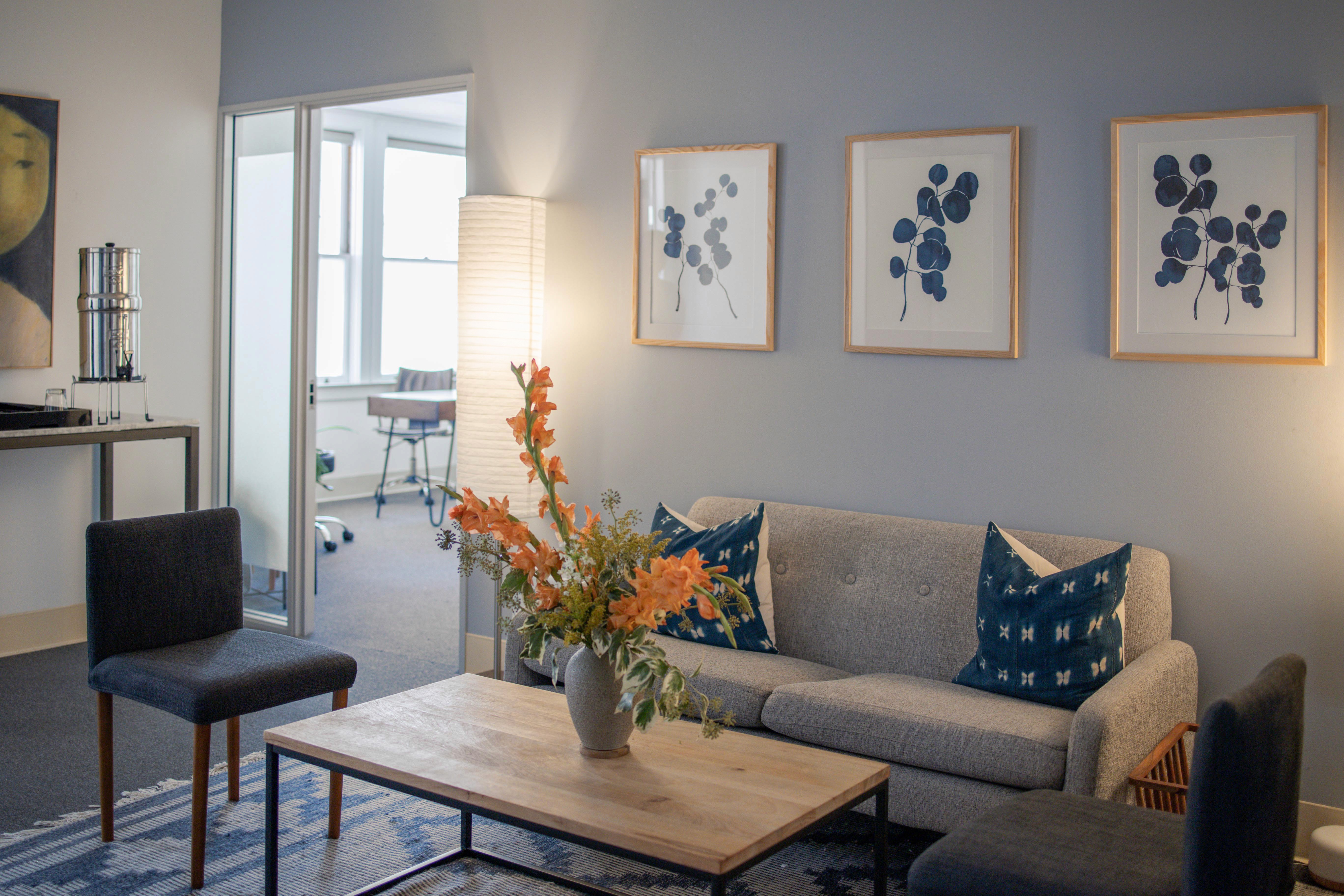 Yoga studio with mats, bolsters and plants