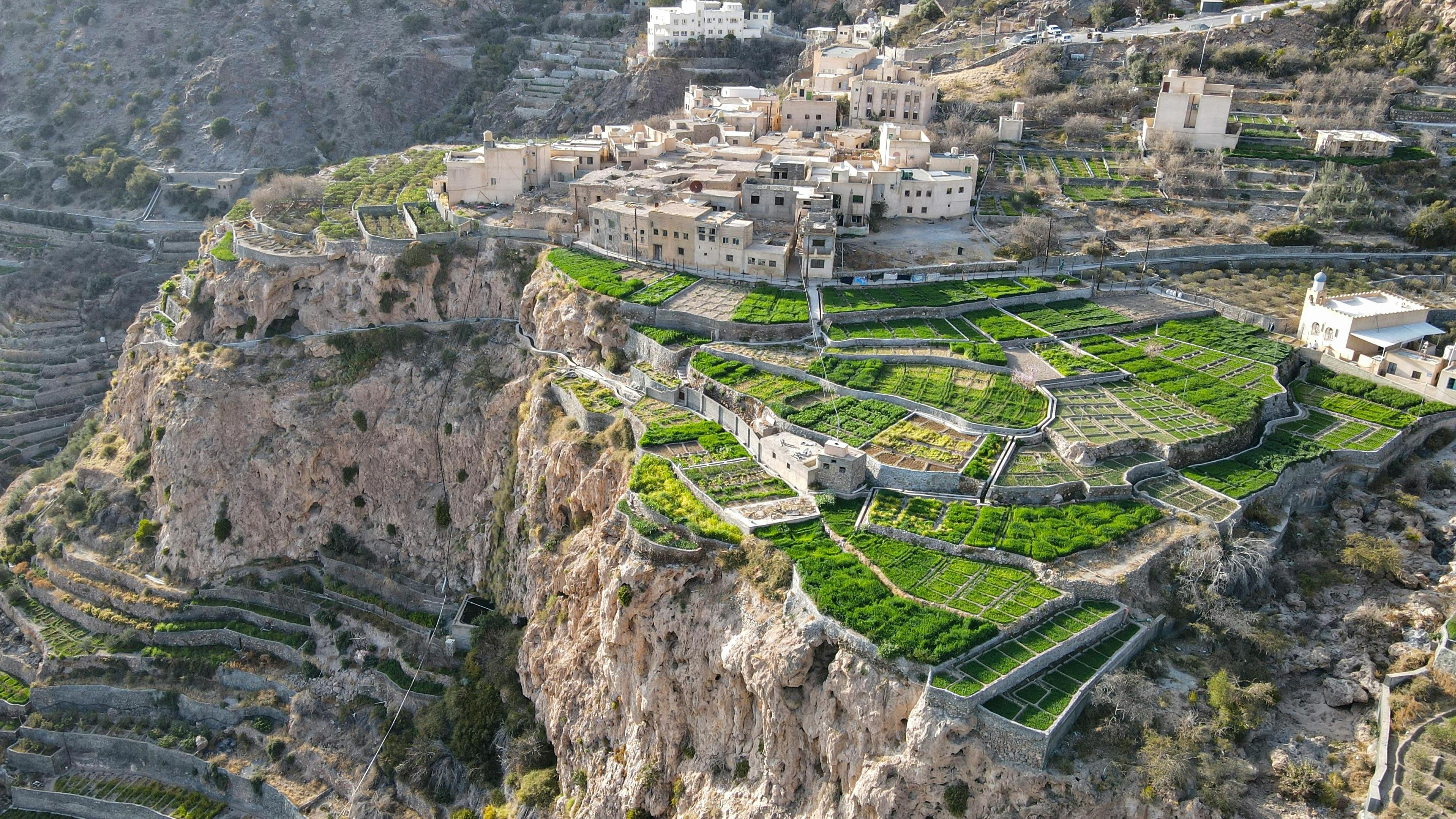 a black and white living room with a large tv