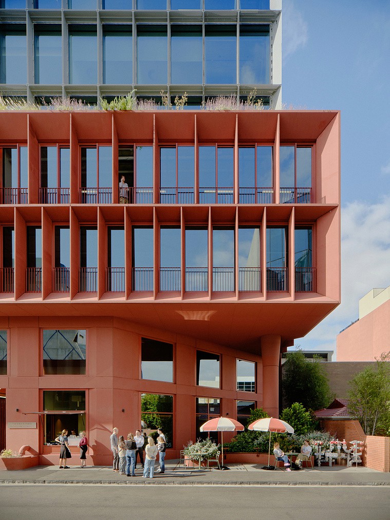 Tall apartment buildings create a narrow canyon effect.