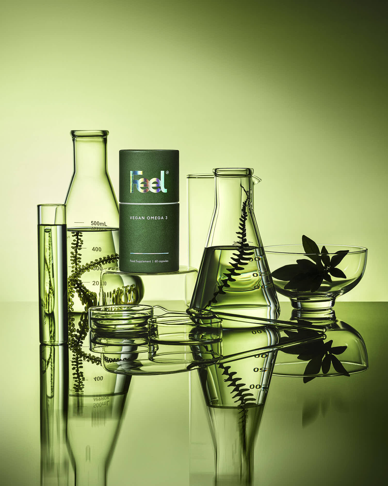 A green-tinted image featuring glass bottles