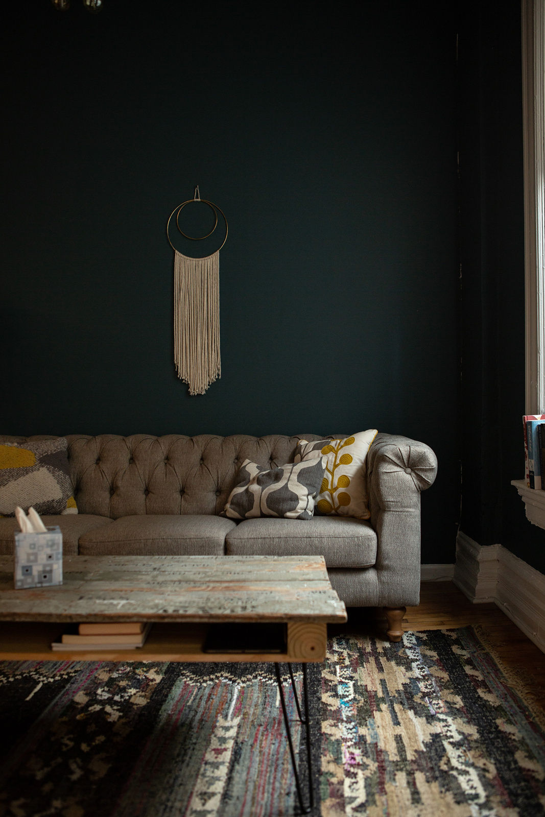 Woman walking on a curved pavement with shadow.