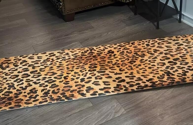 Leopard print runner rug brings elegance and charm to any space.