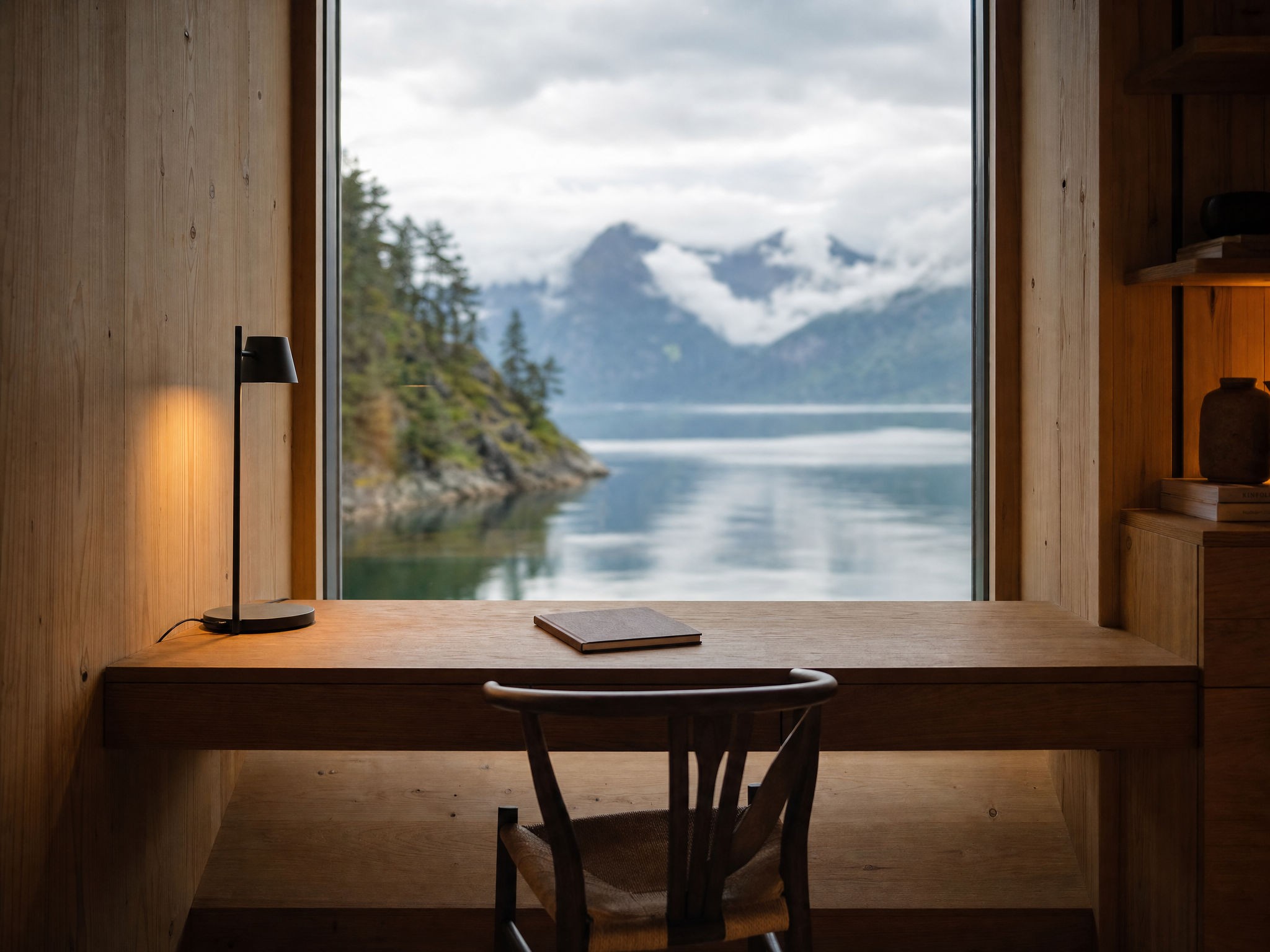 Quiet cabin interior with simple furniture and daylight