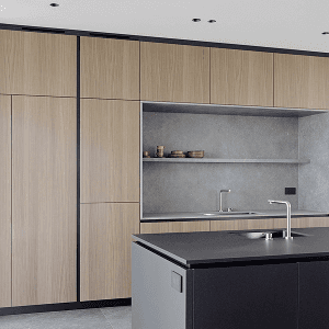 Contemporary kitchen with wood cabinets and a dark island
