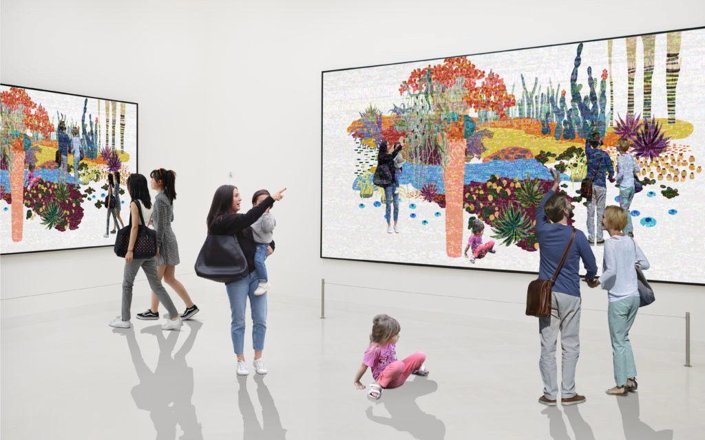 people looking at artwork in an exhibition