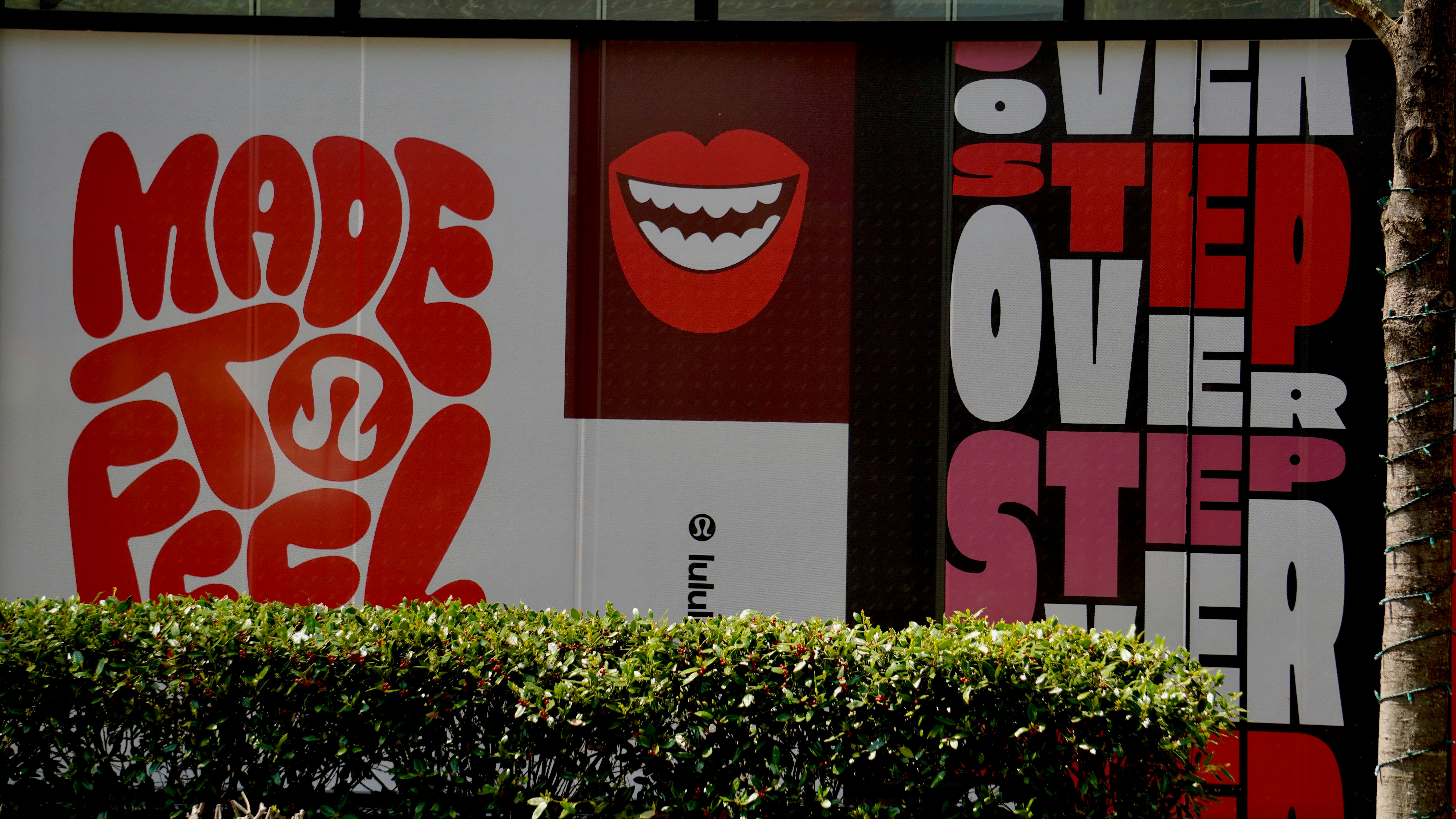 Red text and graphics on a building