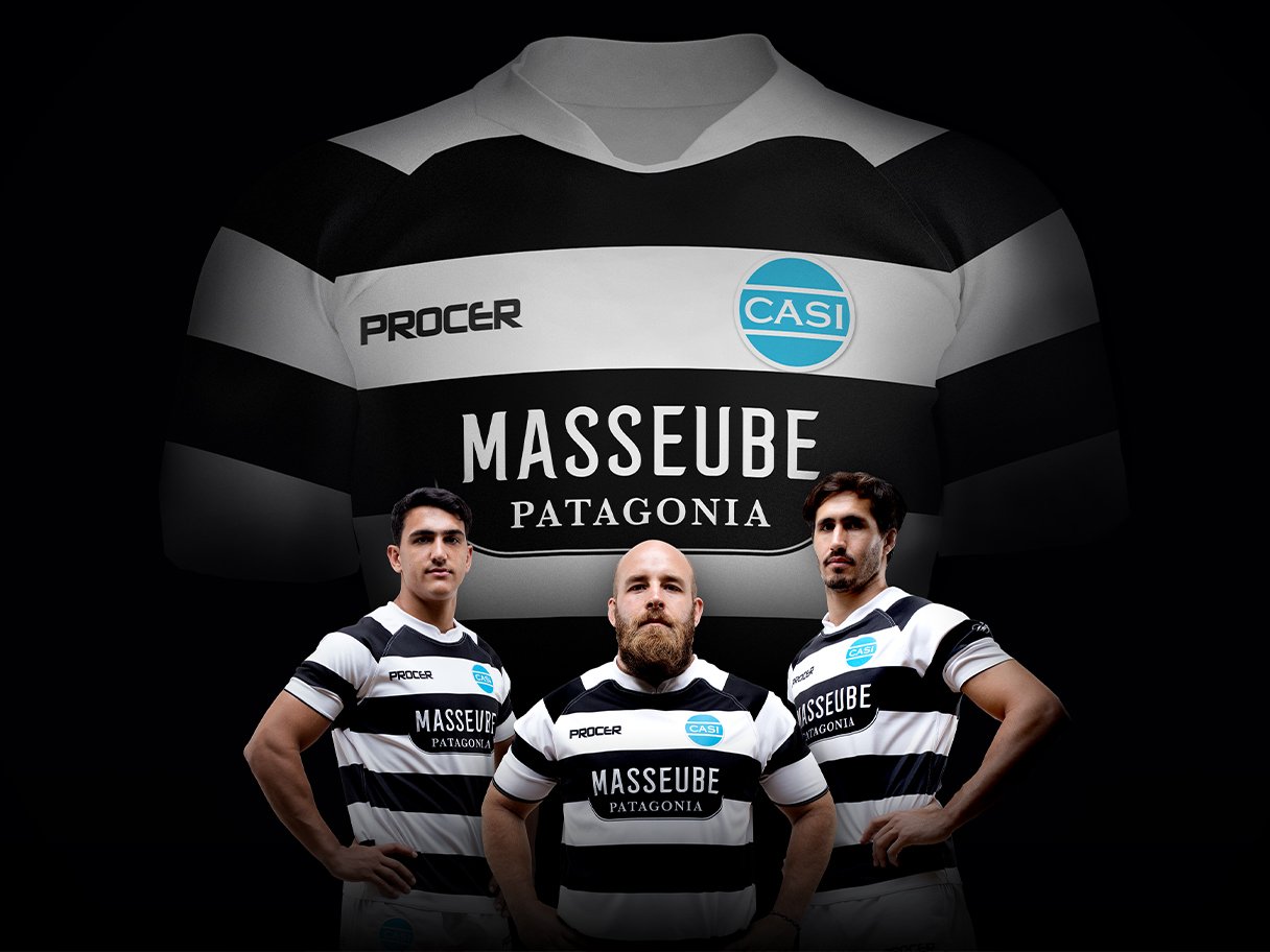 Rustic cabin in a golden field at sunset