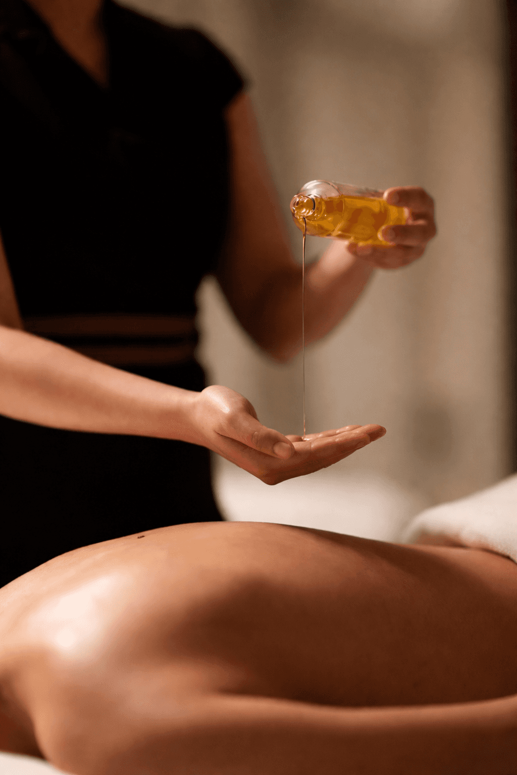 flat lay shot of spa amenities by the bathtub