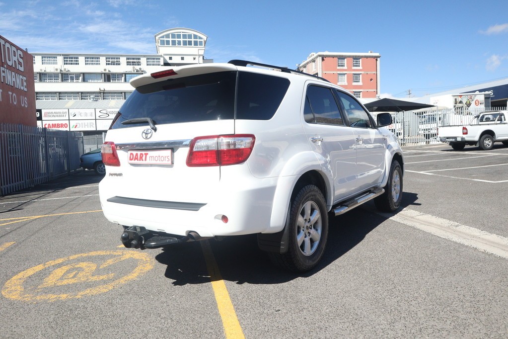 man in white crew neck shirt wearing black framed eyeglasses