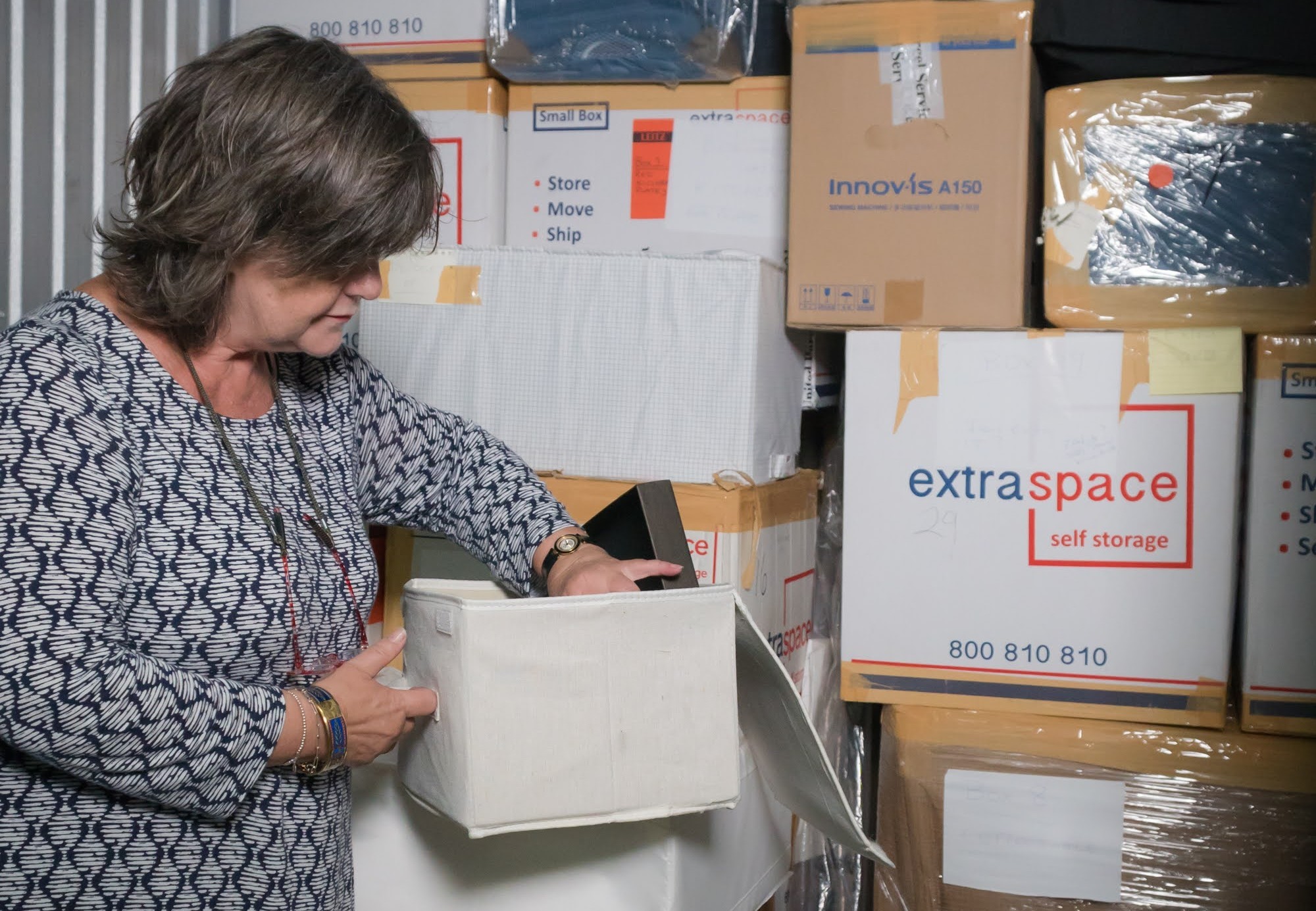 Woman double-checking items before Dubai Customs clearance