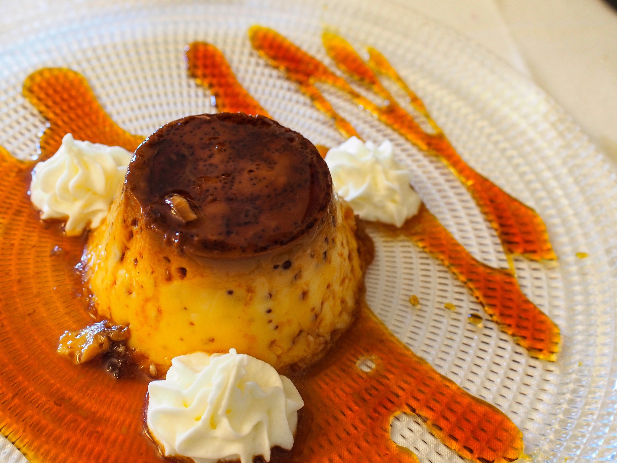 a person is holding a bowl of ice cream