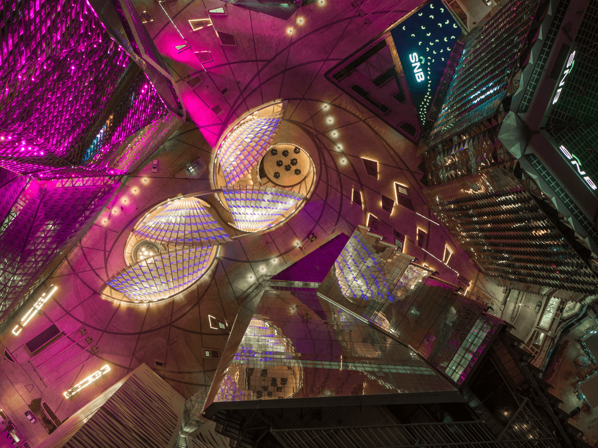 A vibrant and colorful view of KAFD at night from the top.&nbsp;