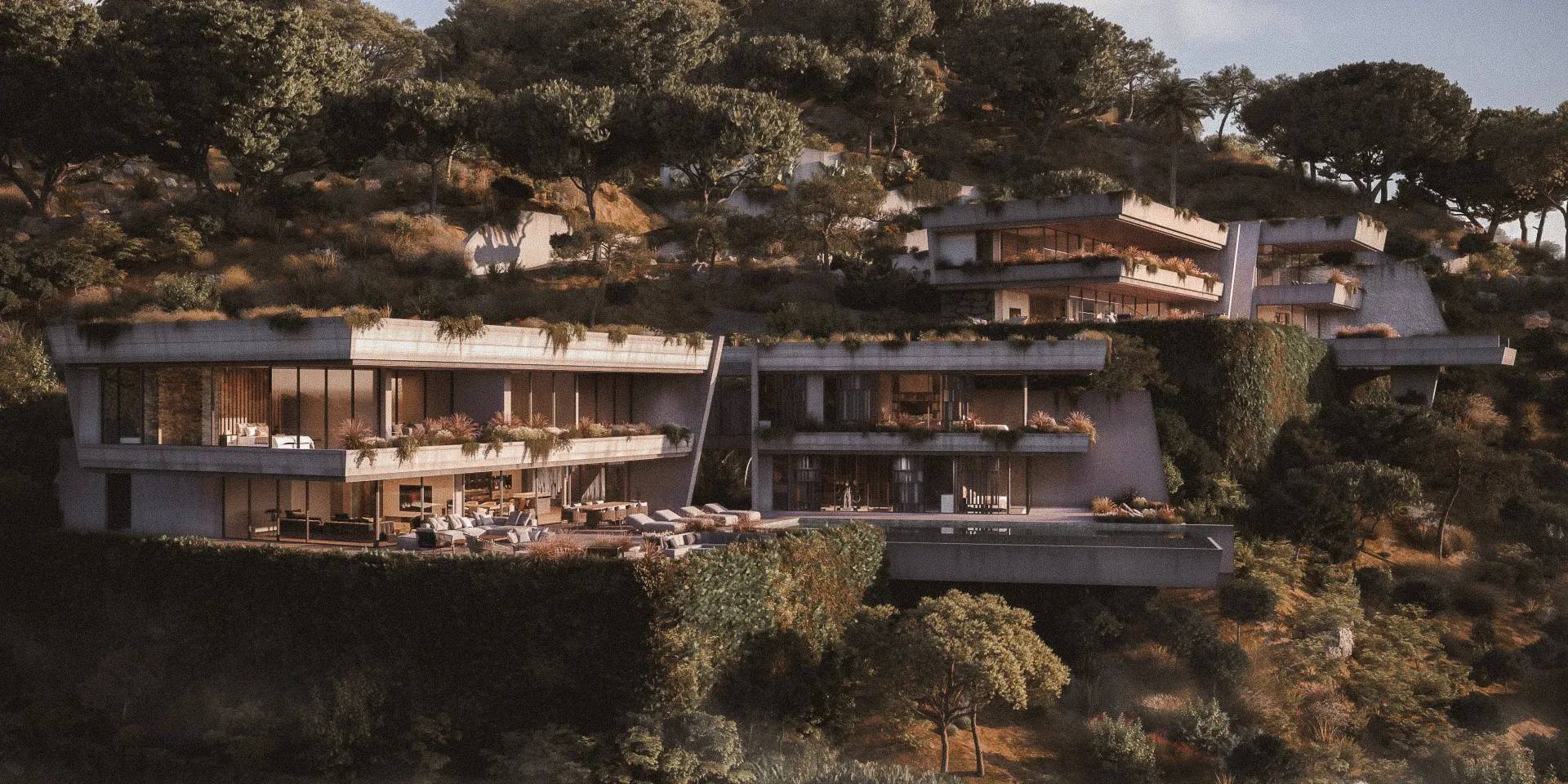 Contemporary luxury villa in El Madroñal with natural stone architecture and landscaped terraces.