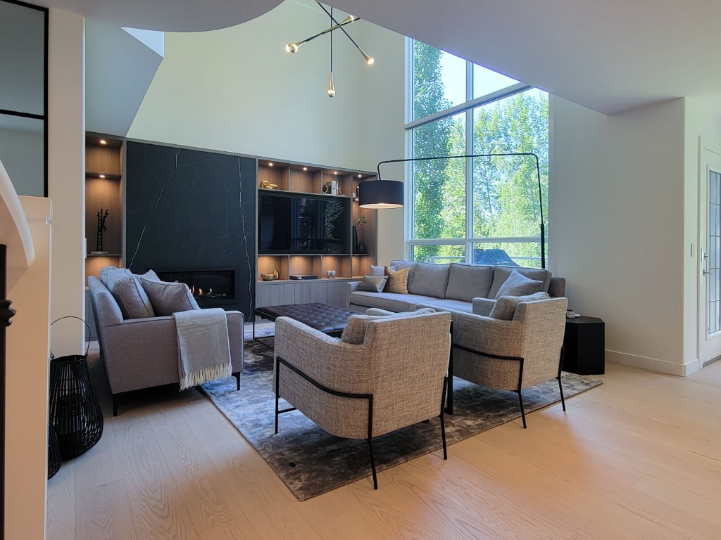 Image of Luxurious living room design by KHD Homes featuring furniture, layout design, and interior design elements.