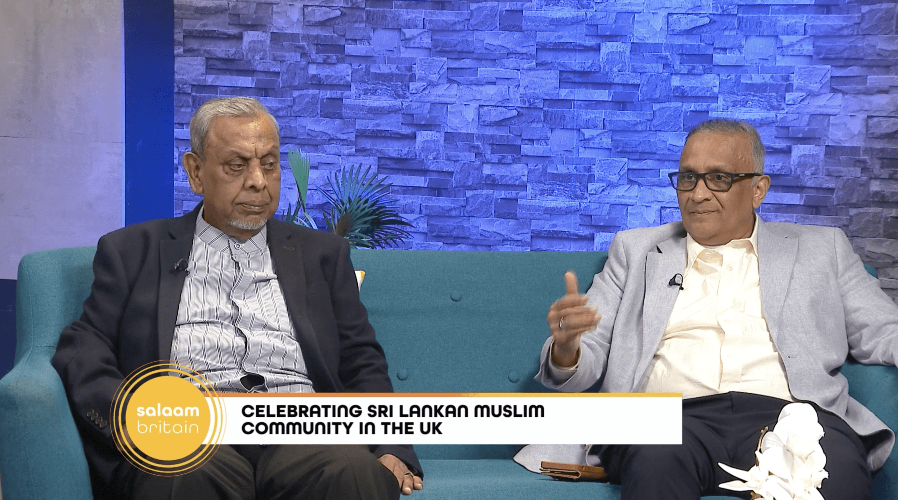 a black and white living room with a large tv