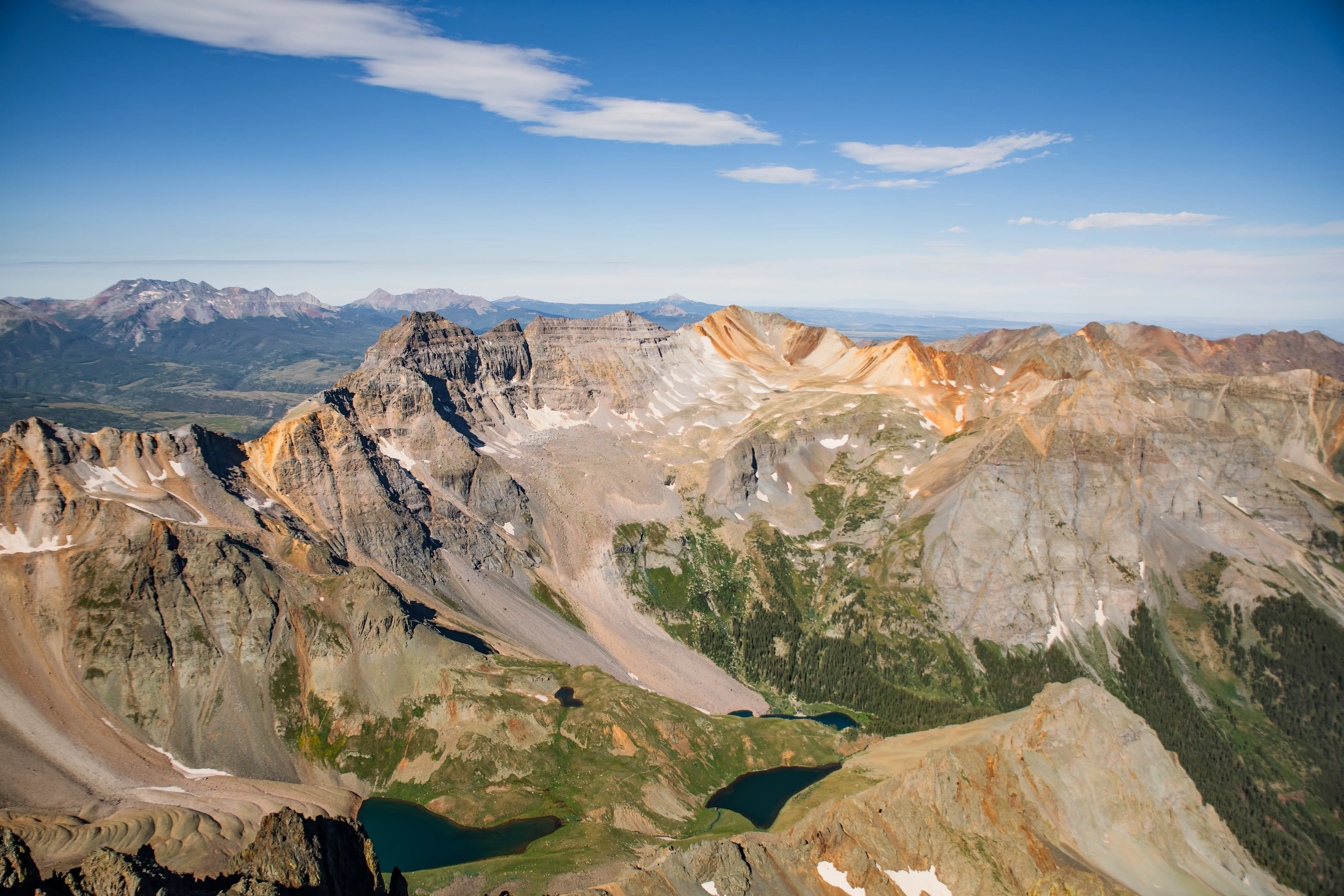 Streetside billboard with flyposters of the Batch.Works brand and illustrations