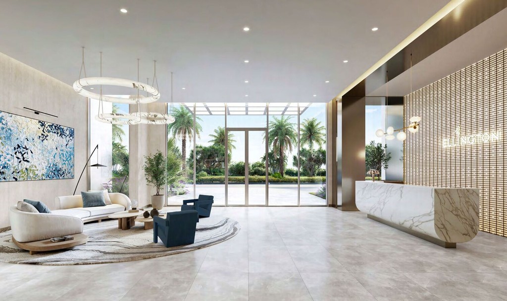 Stylish living room and kitchen space in Windsor House II, featuring modern design elements and an open floor plan.