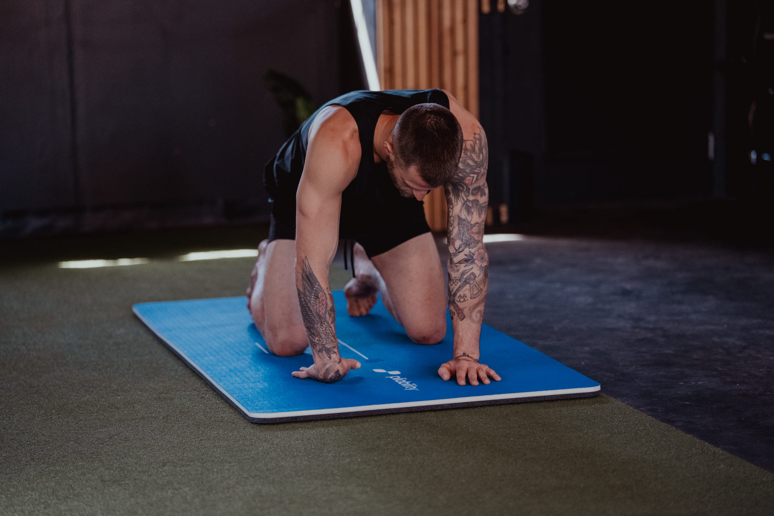 man focusing on arm - Left Arm stiffness