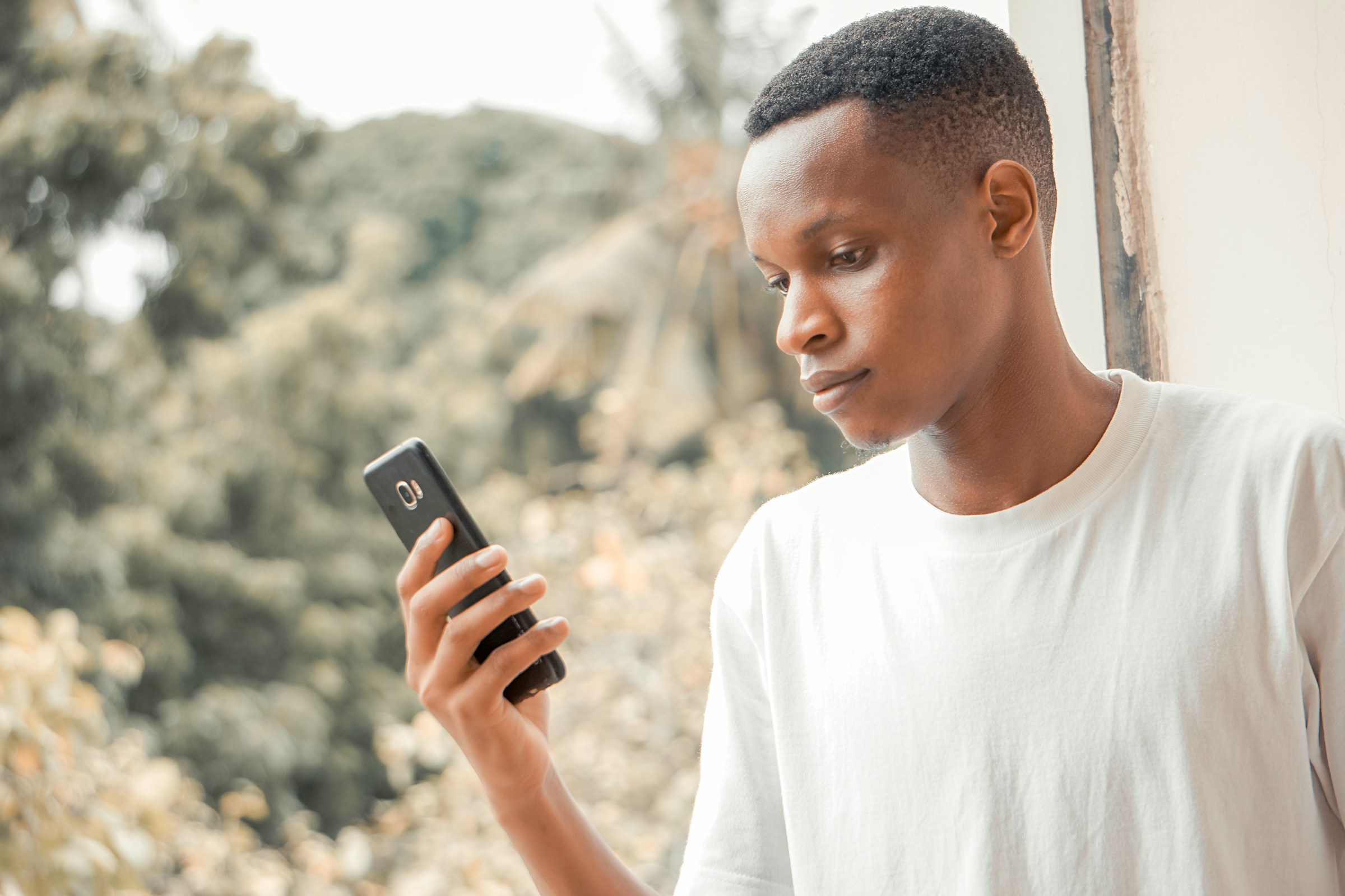 man checking out trends - What Does Viral Mean in Social Media