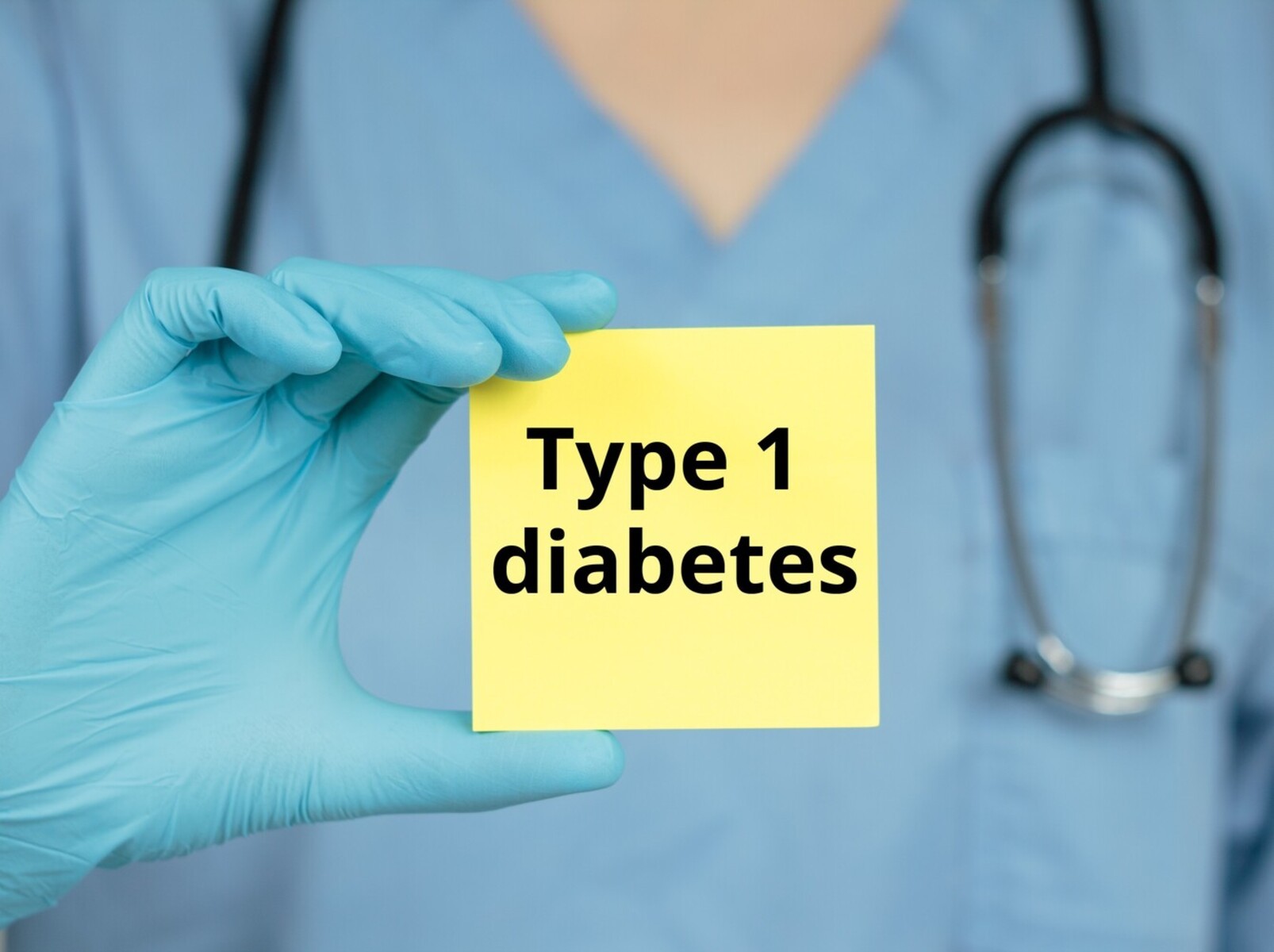 medical professional holding up a note with diabetes type 1 written on it as a concept for diabetes injections for weight loss