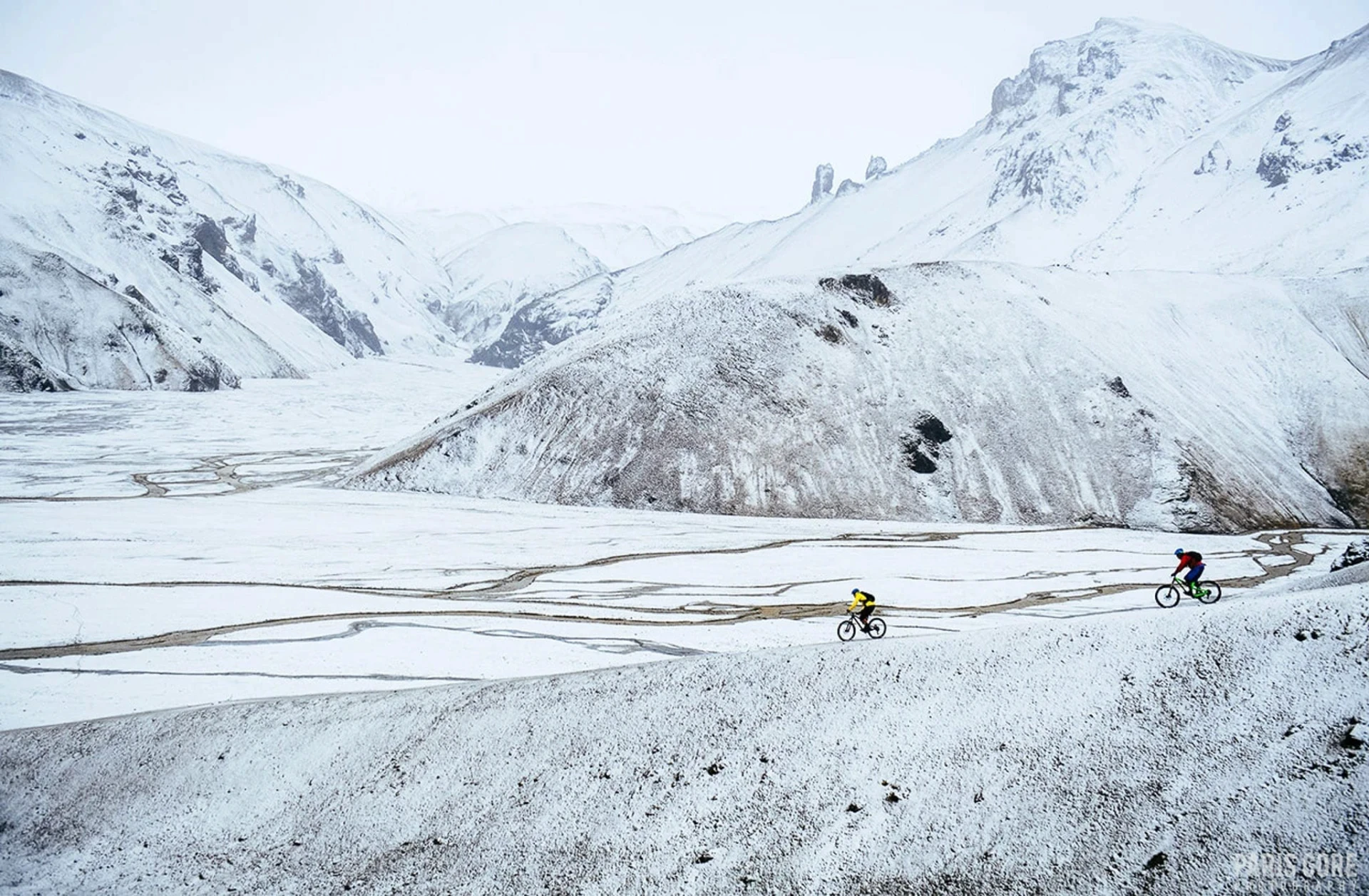 MTB snow riding downhill on mountains