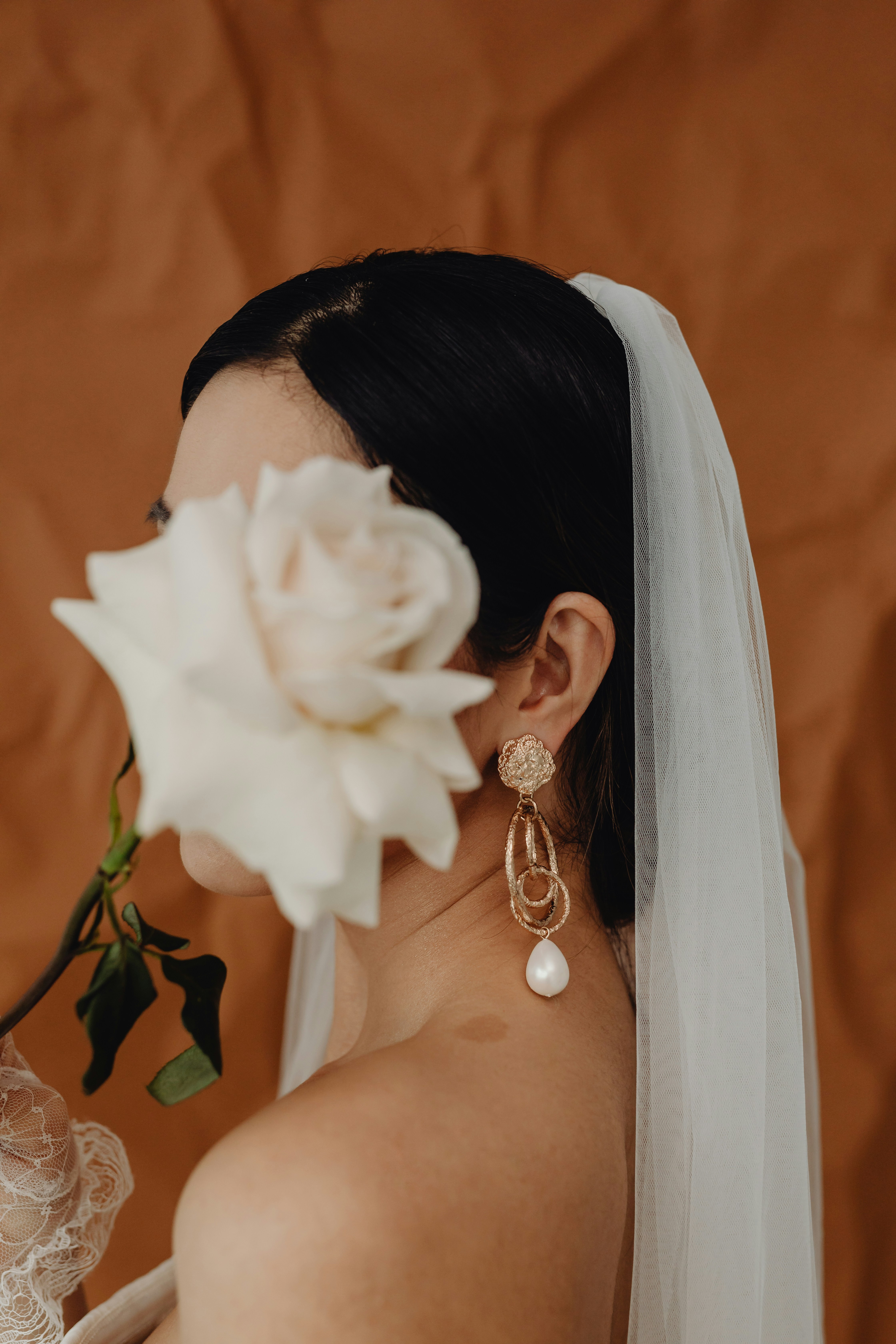 A Bride holding a rose