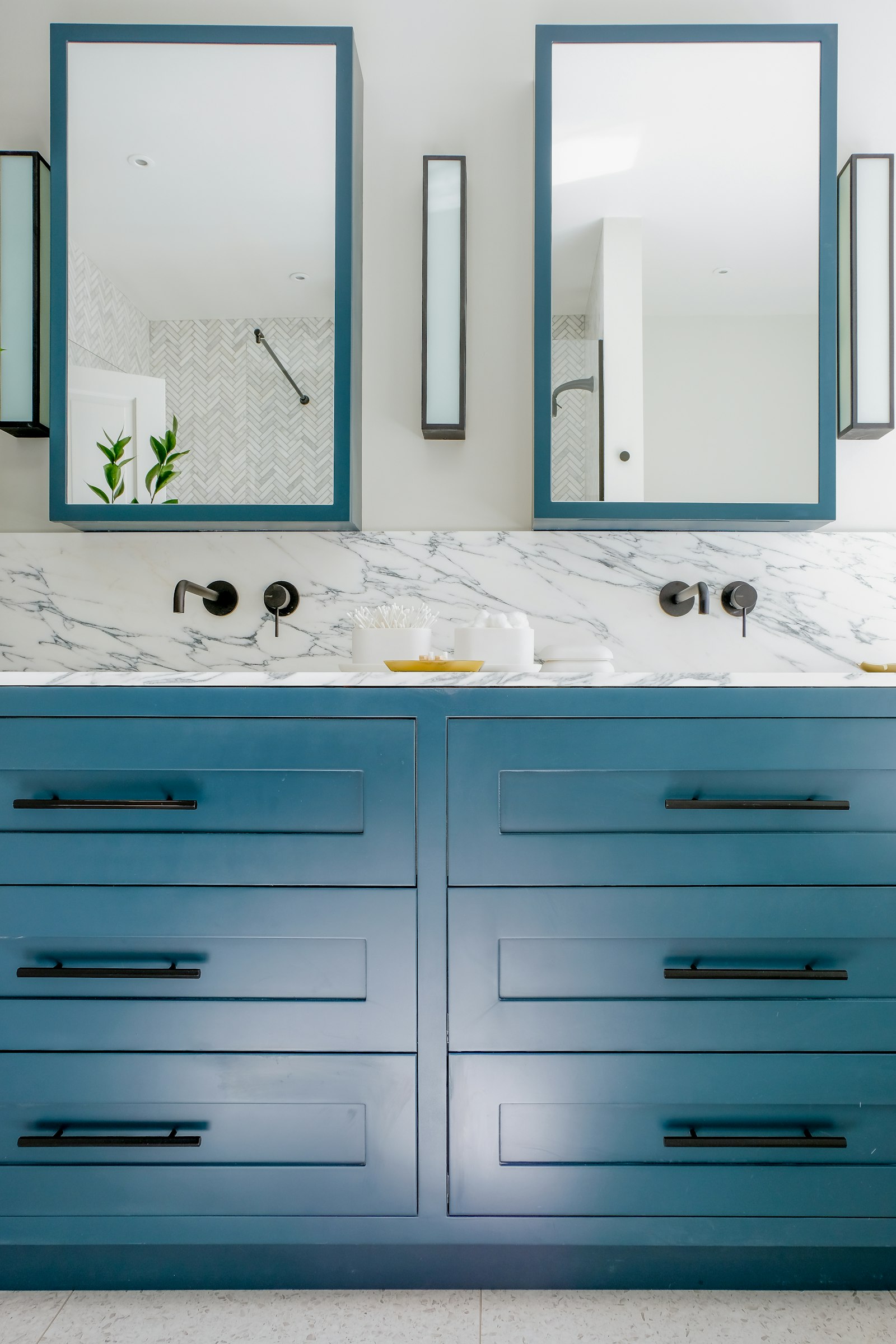 White fitted kitchen units with a sink