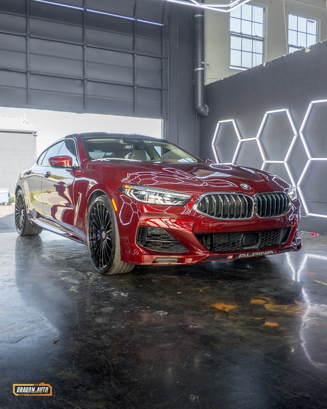 Deep red 2022 BMW Alpina B8 Gran Coupe with Icon Rocklear paint protection at Dragon Auto Milpitas