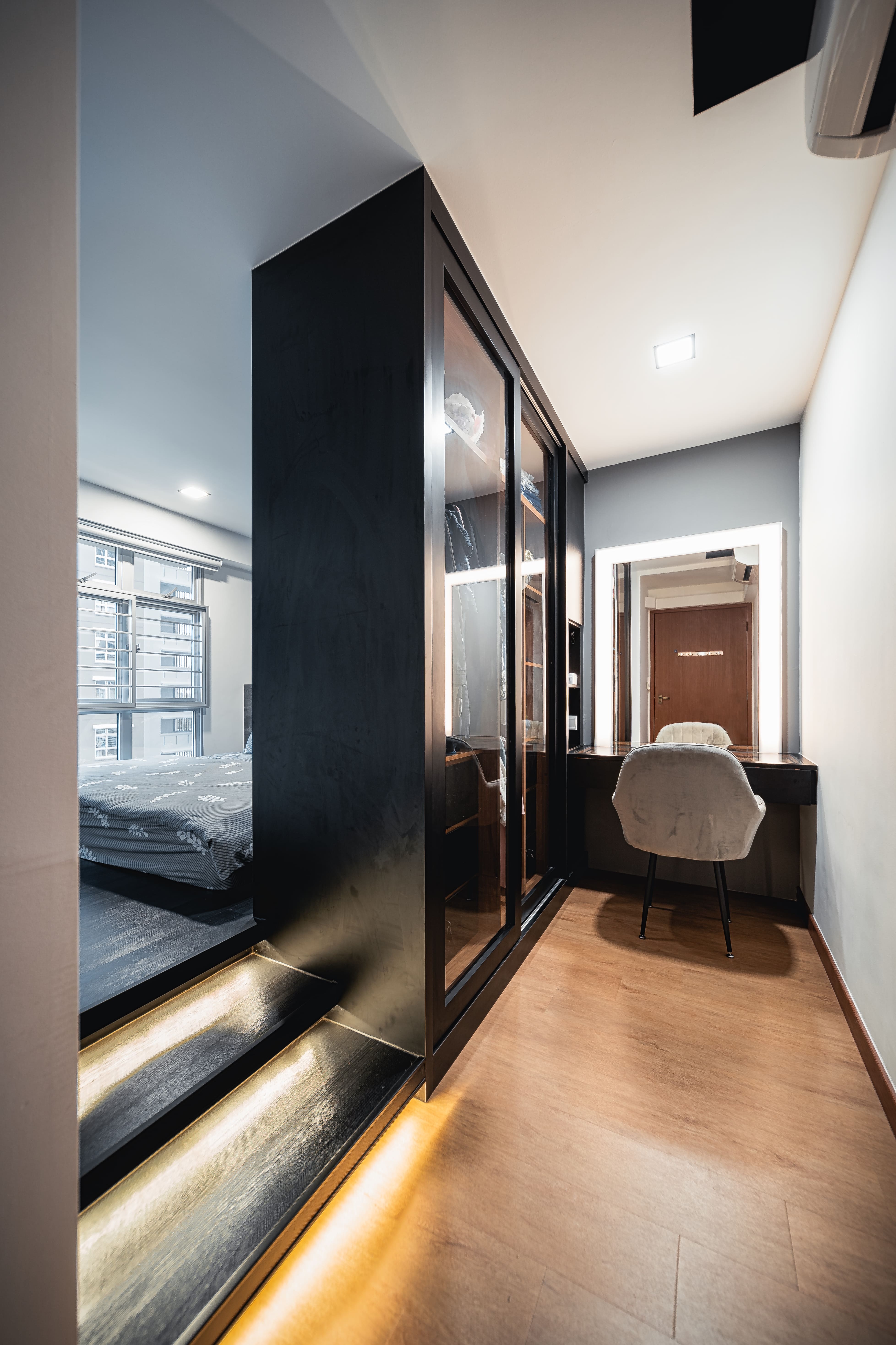 Master suite featuring integrated wardrobe, vanity, and underlighting for a calm, elegant retreat.